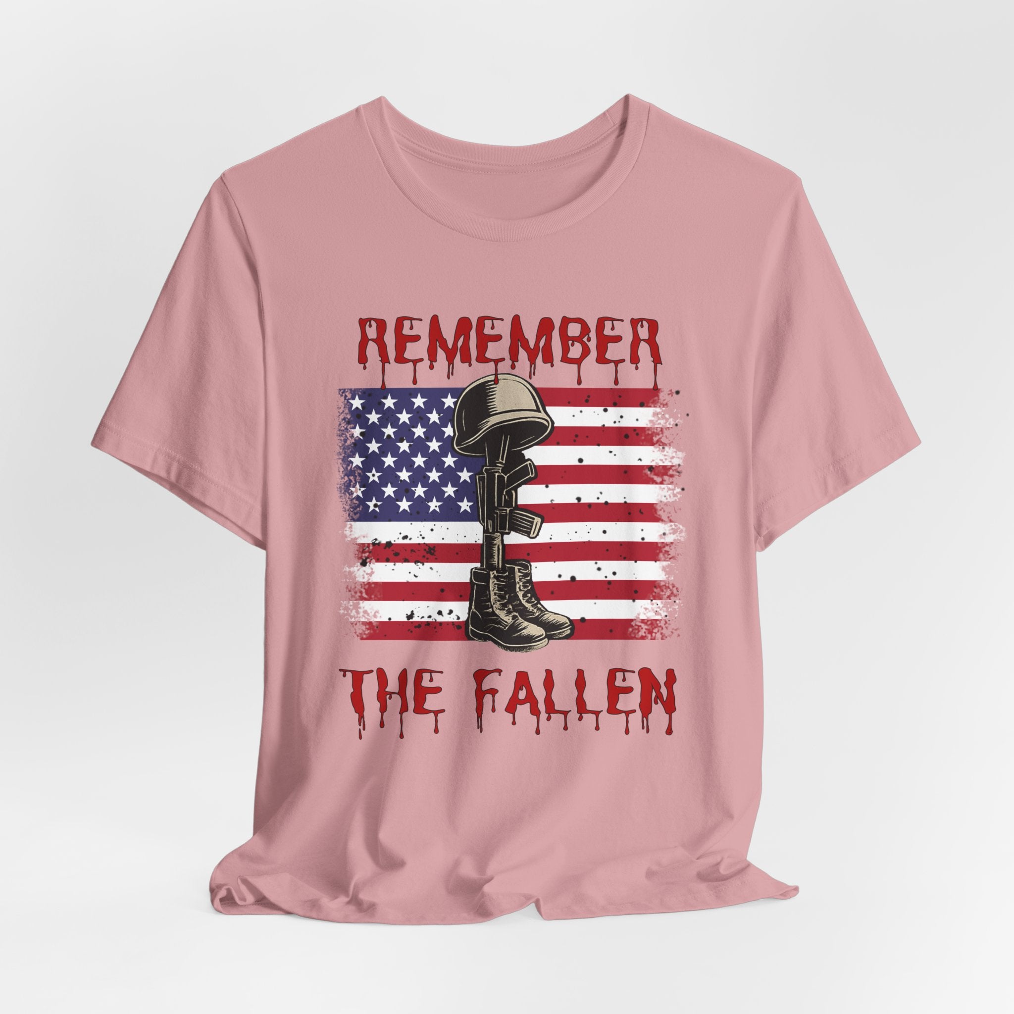 Orchid pink t-shirt with vintage American flag and military gear themed design with remember the fallen text on a white background