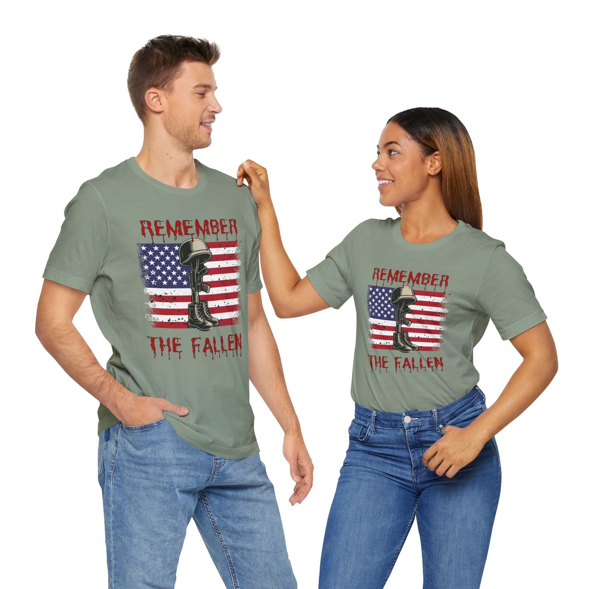 Two people wearing matching green t-shirts with a boot and American flag design on a white background.