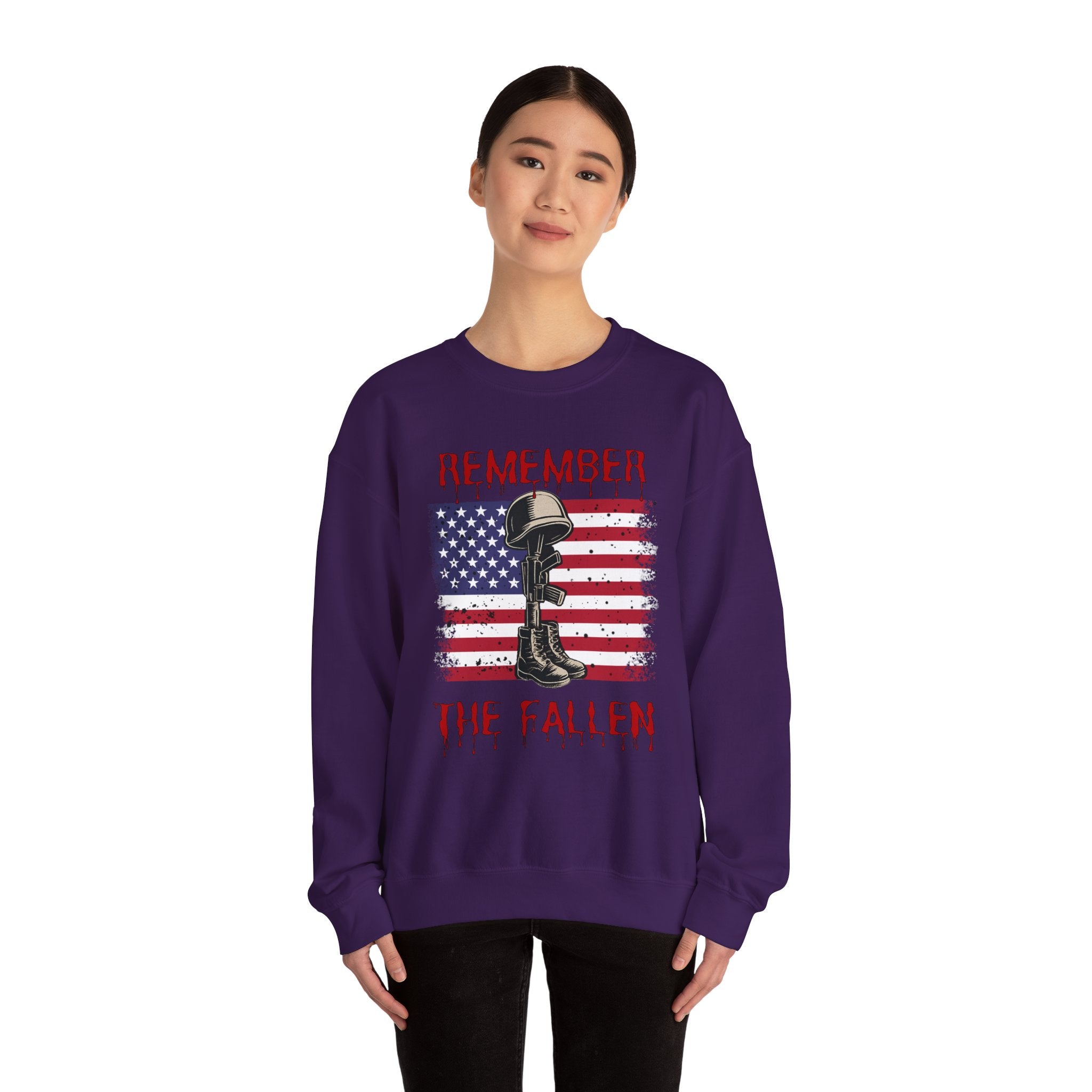 Purple sweatshirt with American flag and boot design, worn by a person on a white background