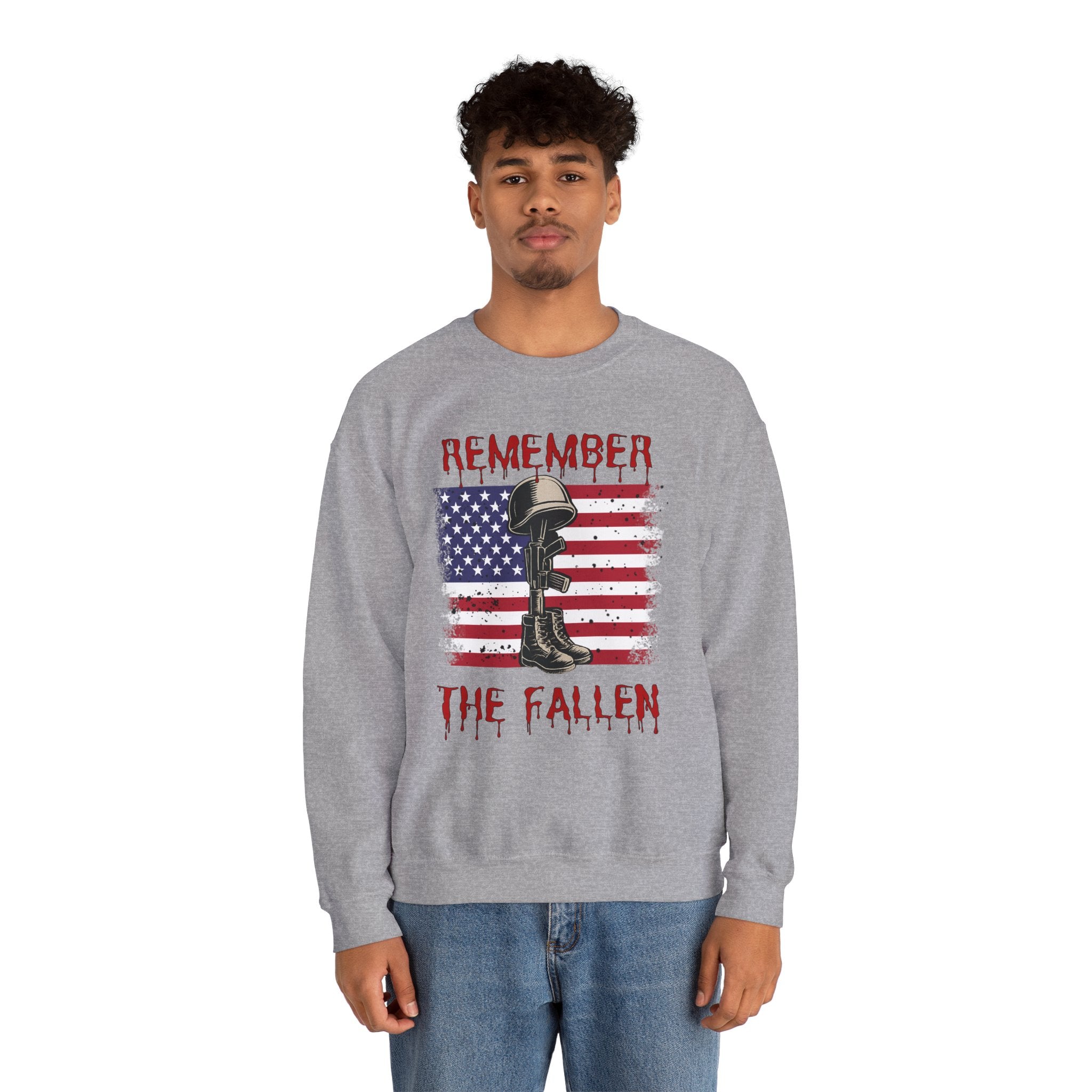 Person wearing a gray sweatshirt with a graphic design and text on a white background