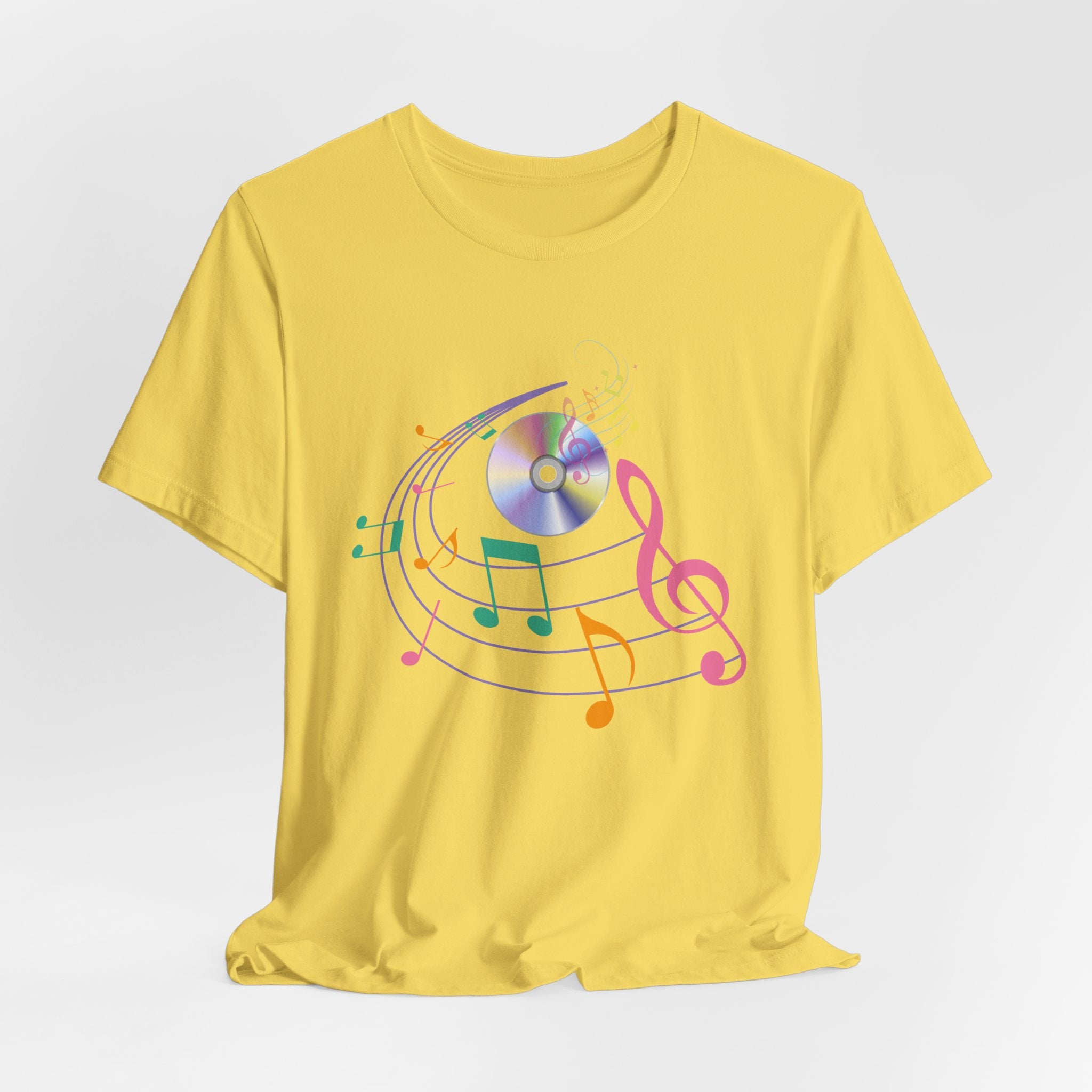 Yellow t-shirt with CD and colorful music note design on a white background