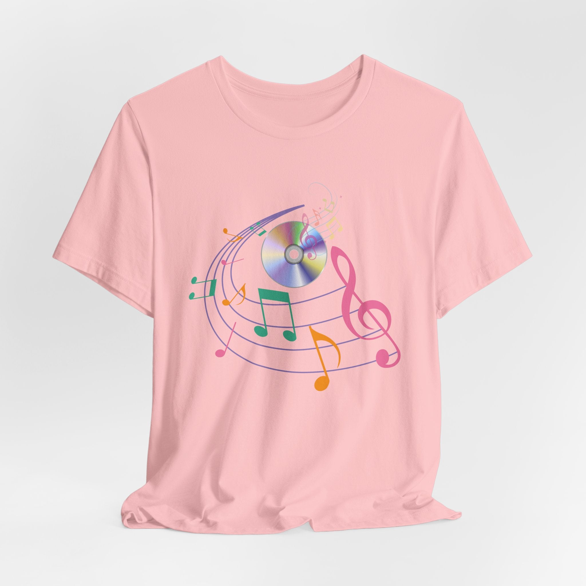 Pink t-shirt with CD and colorful music note design on a white background