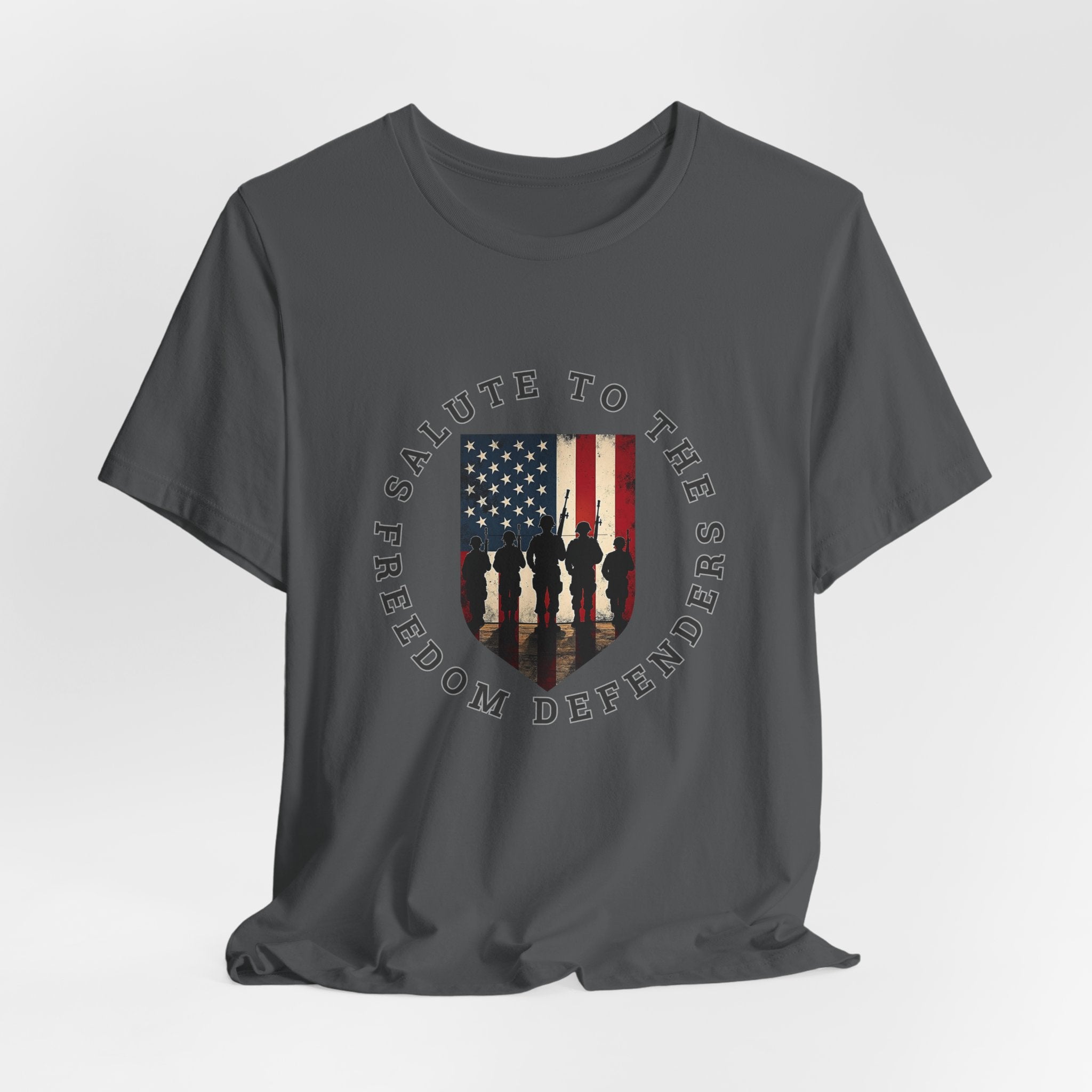 Asphalt gray t-shirt with 'Salute to the Freedom Defenders' graphic featuring an American flag and silhouette of soldiers on a white background.
