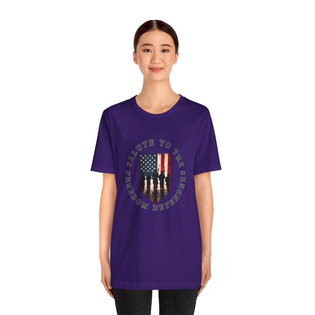 Person wearing a purple t-shirt with a graphic design on a white background