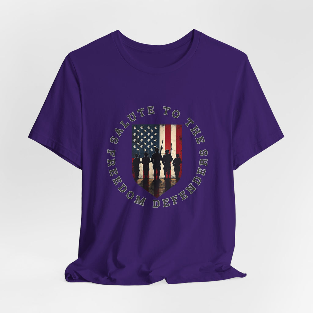Team purple t-shirt with 'Salute to the Freedom Defenders' design featuring an American flag and silhouette of soldiers on a white background.
