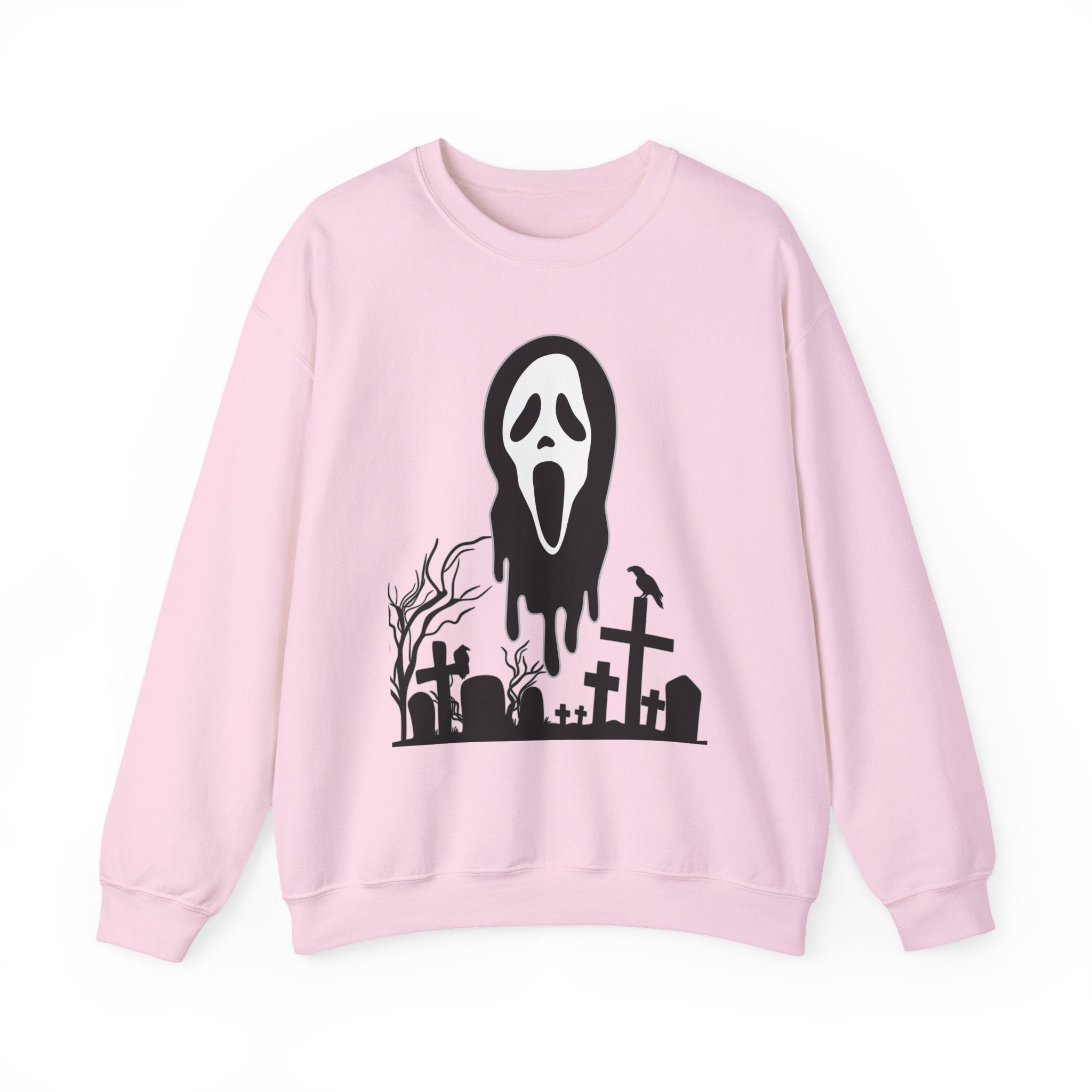 Pink sweatshirt with a black graphic of a ghost face and graveyard on a white background