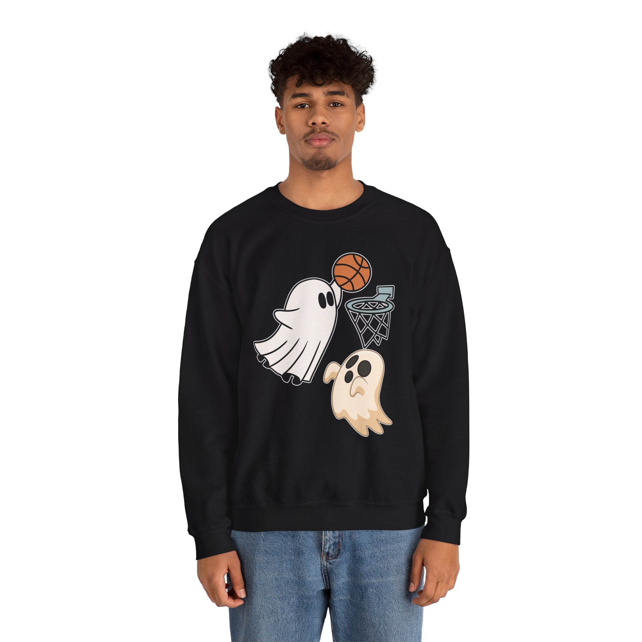 Person wearing a black sweatshirt with ghost and basketball design on a white background