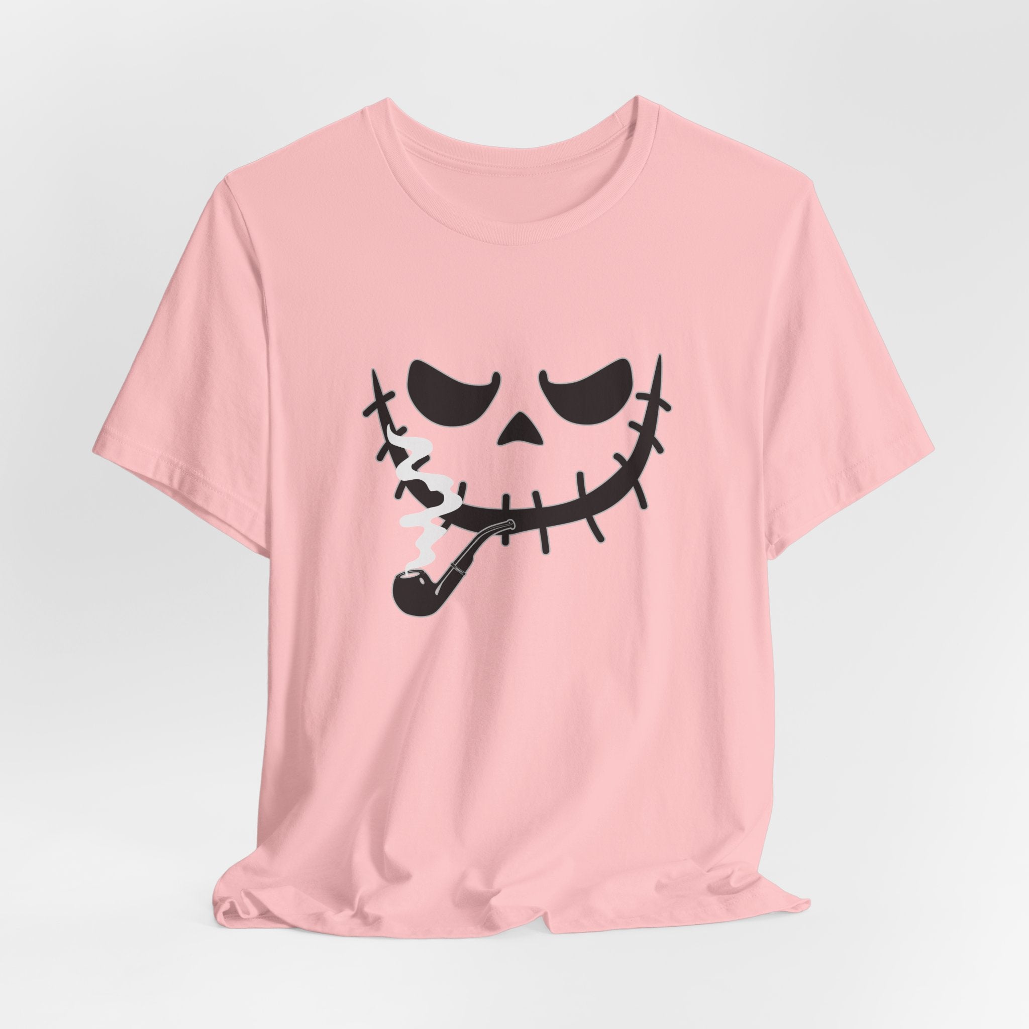 Pink t-shirt featuring smoking scary monster graphics on a light gray background