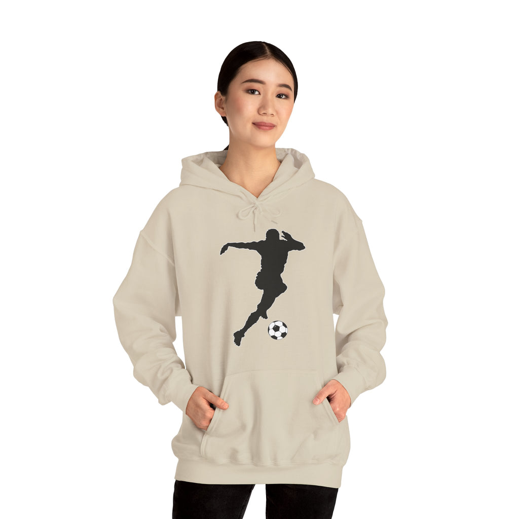 Person wearing a beige hoodie with a black silhouette design of a soccer player and ball on a white background