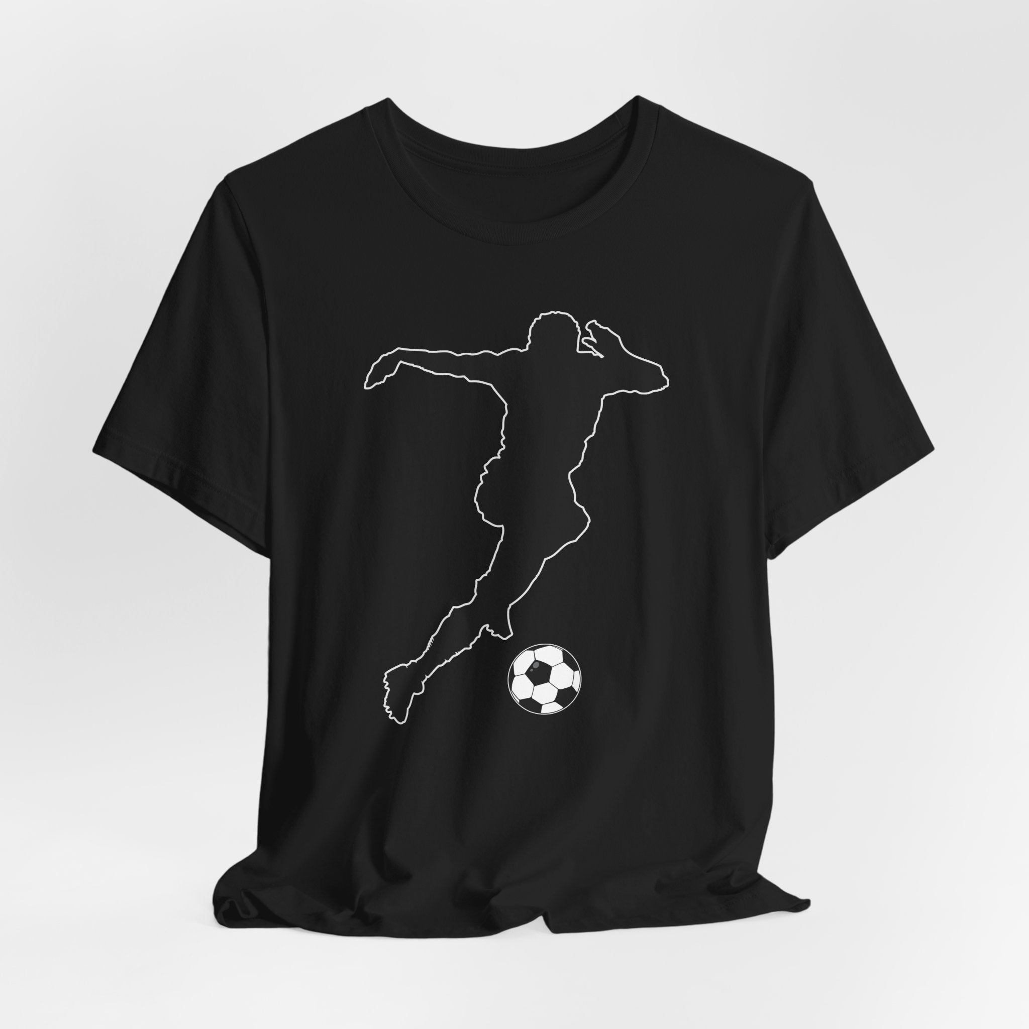 Black t-shirt with a white outline of a soccer player kicking a ball on a light gray background