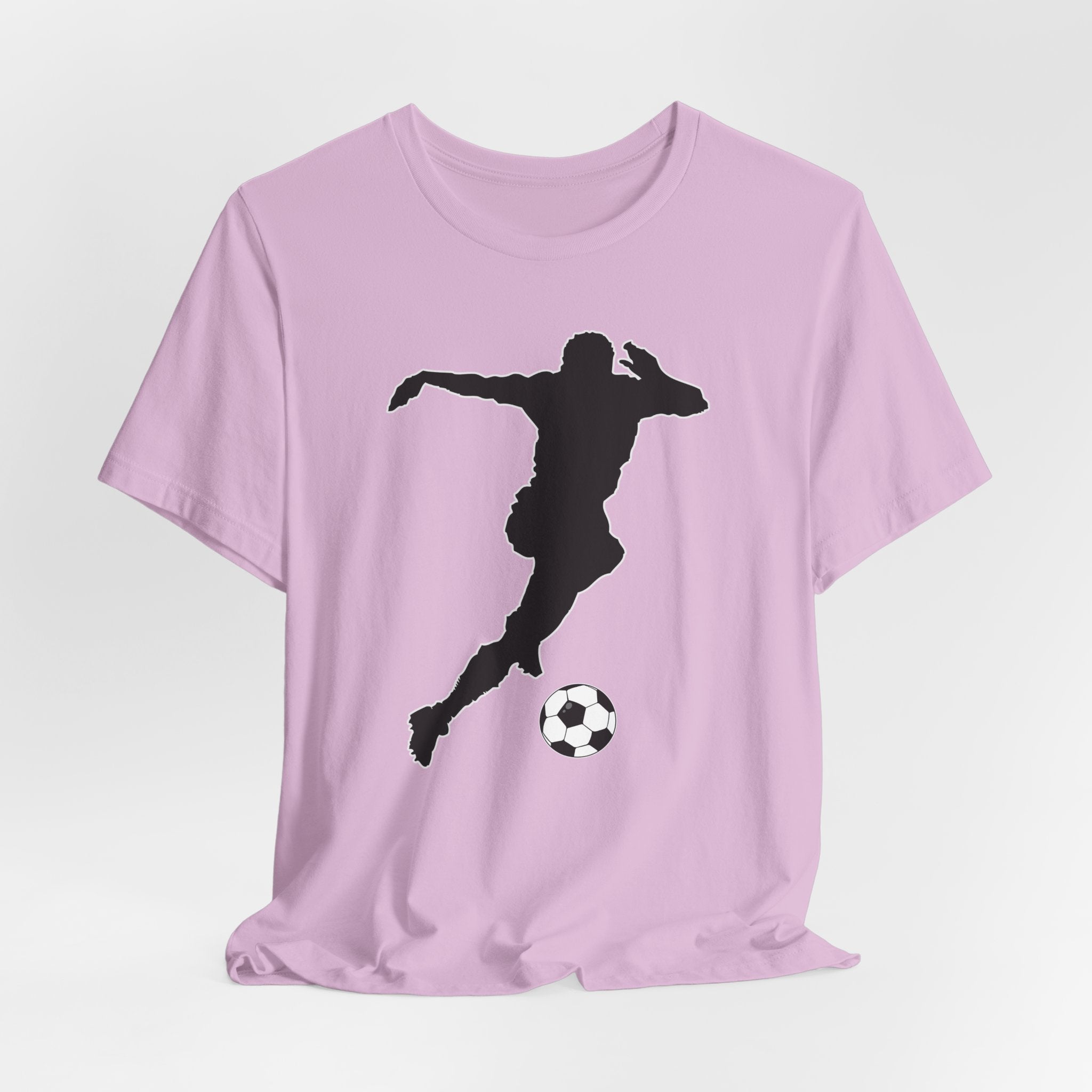 Lilac pink t-shirt with a black silhouette of a soccer player kicking a ball on a light gray background