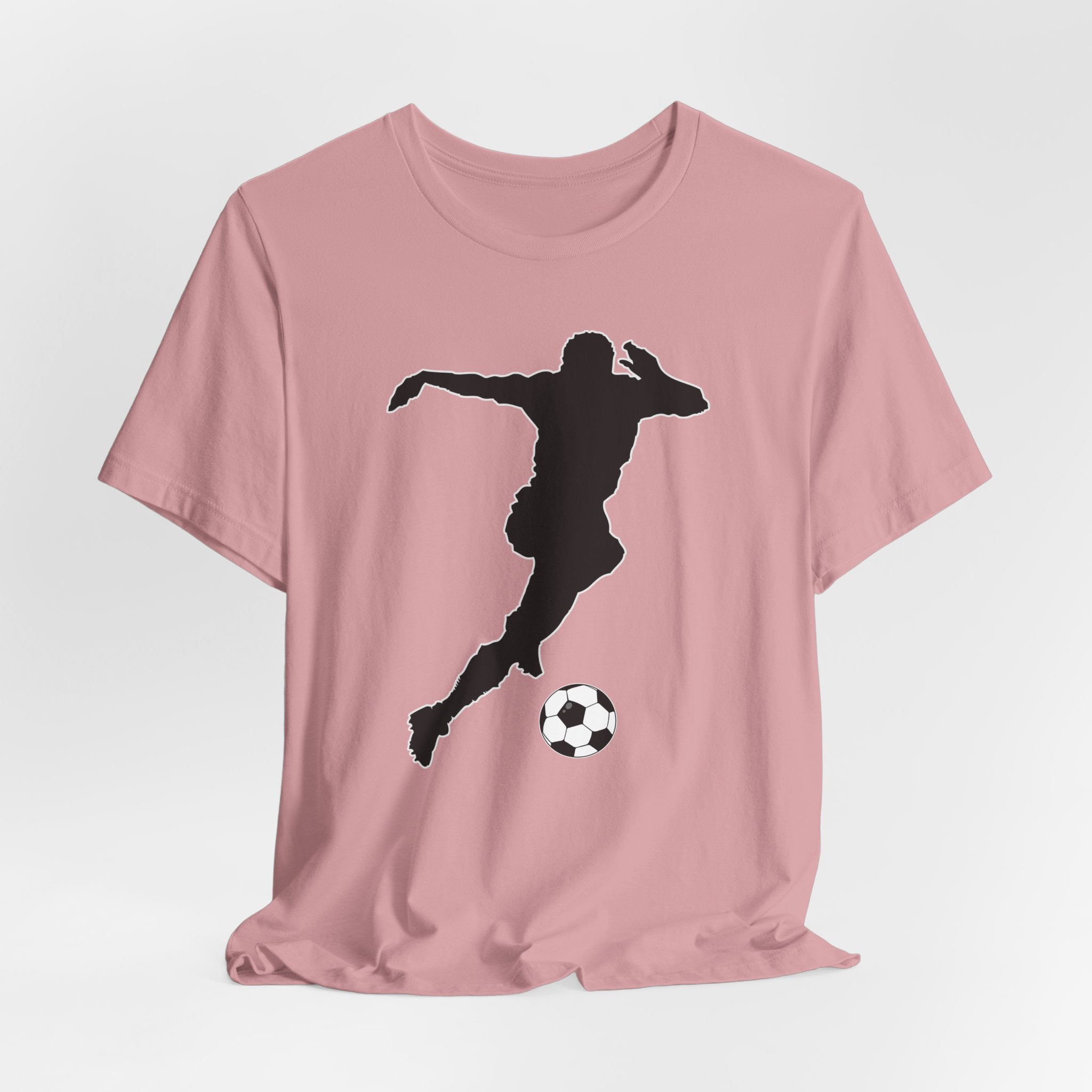 Orchid pink t-shirt with a black silhouette of a soccer player kicking a ball on a light gray background