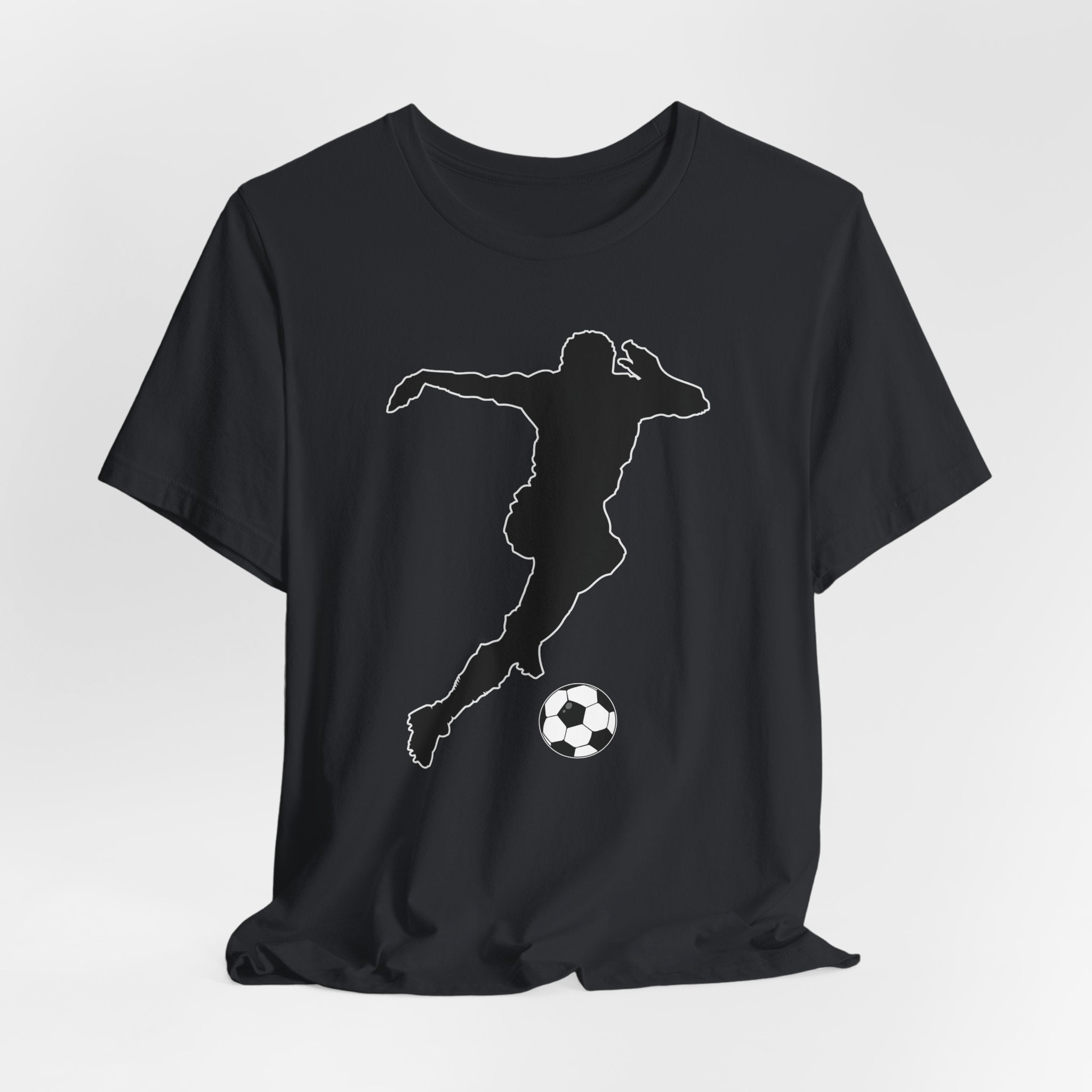 Vintage black t-shirt with a white silhouette of a soccer player kicking a ball on a light gray background
