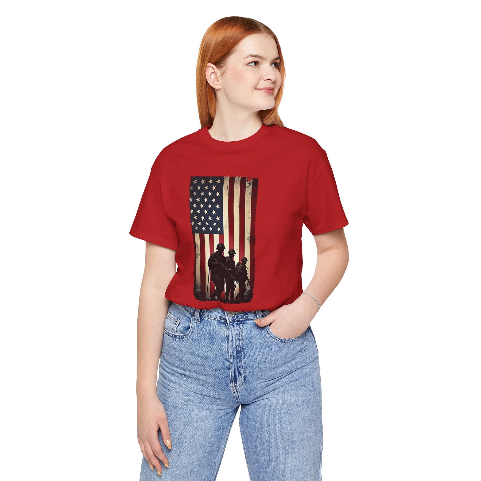 Person wearing a red t-shirt with an American flag design on a white background