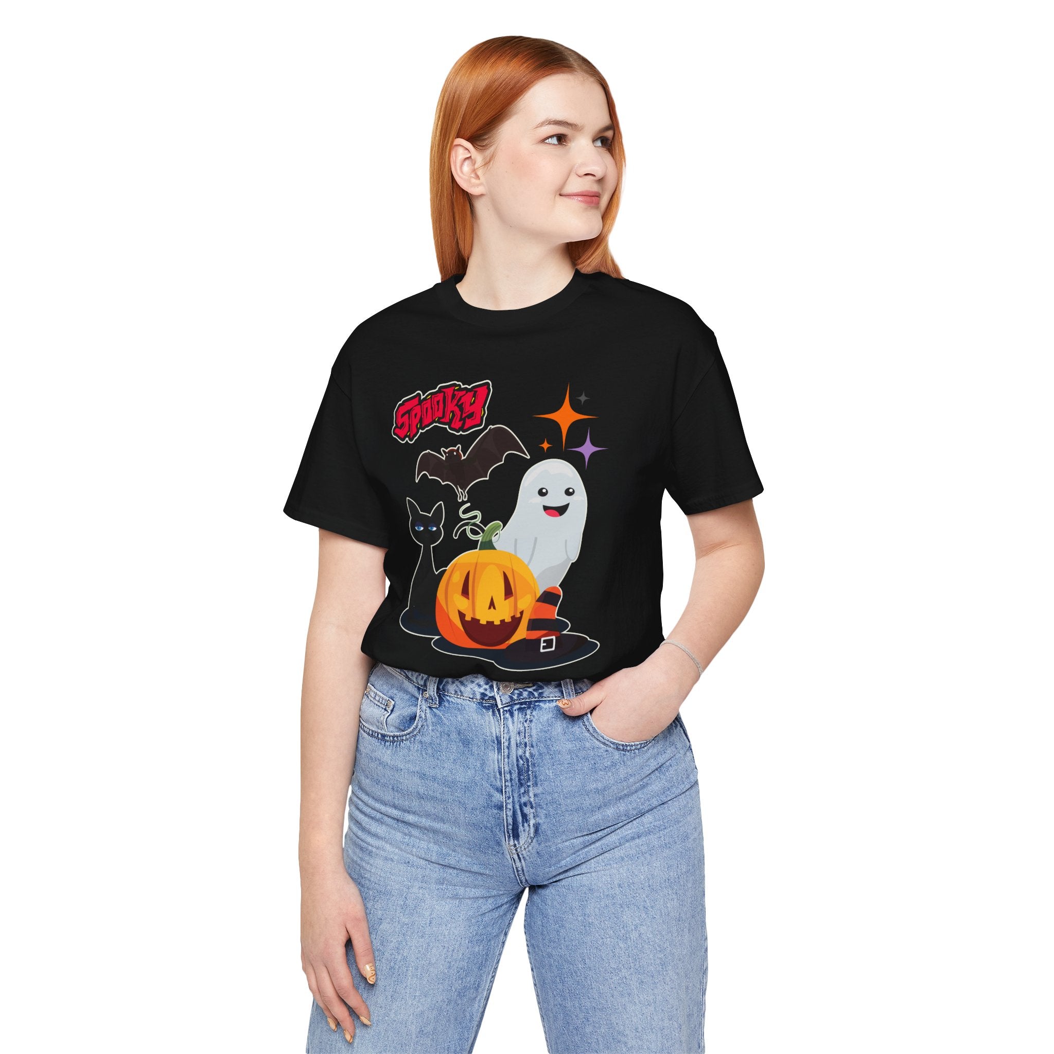 Person wearing a black t-shirt with Halloween-themed graphics on a white background