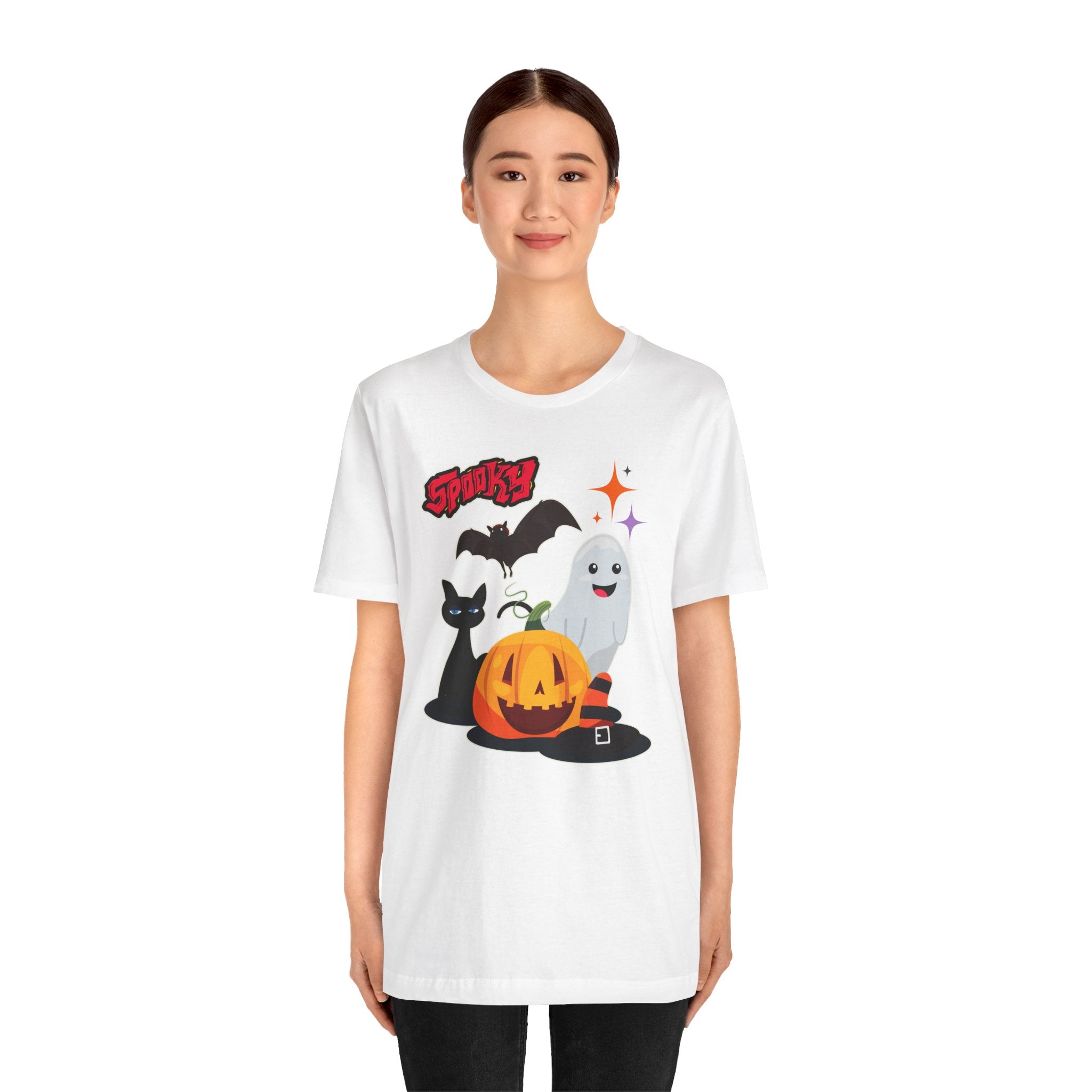 Person wearing a white t-shirt with Halloween-themed graphics on a white background