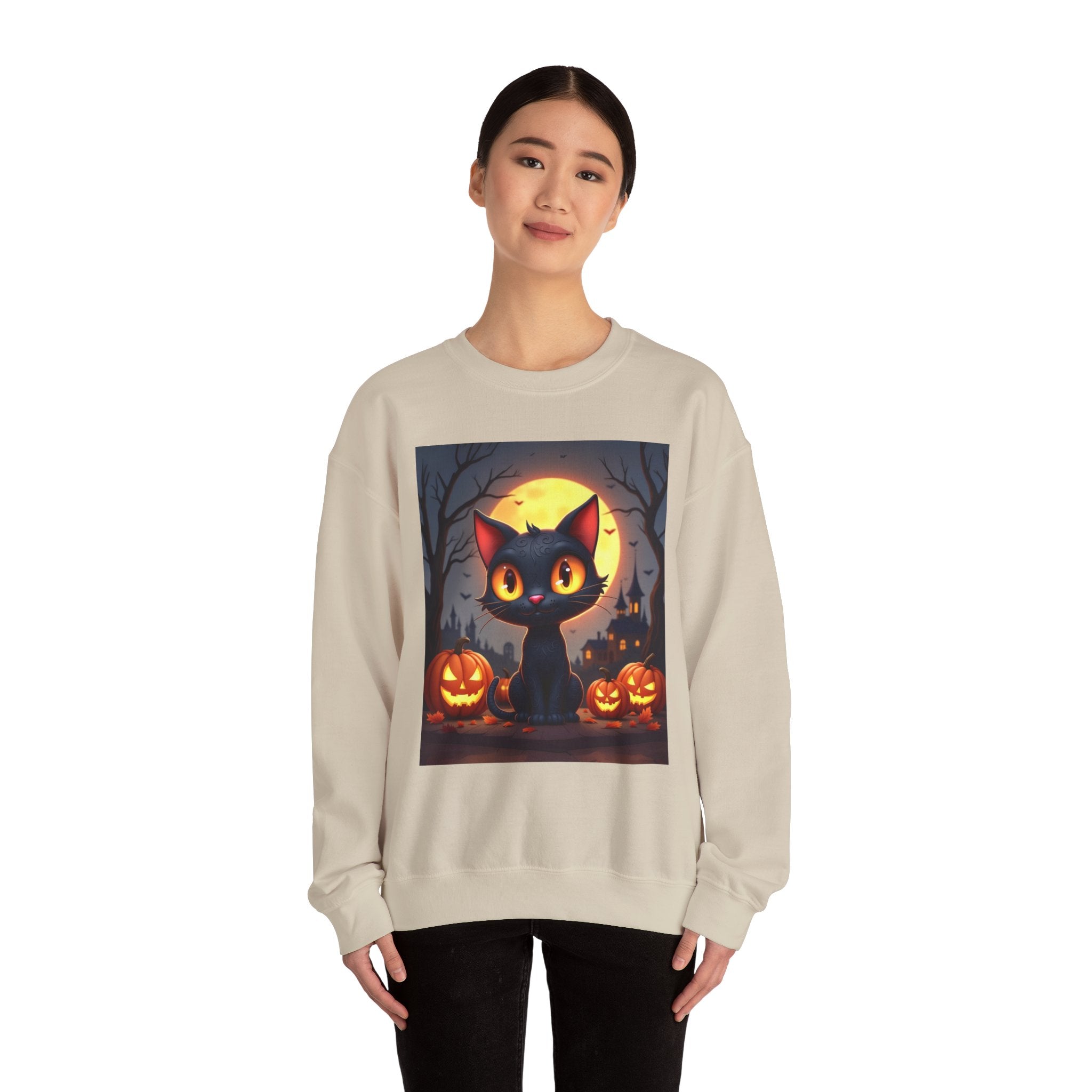 Person wearing a beige sweatshirt with a Halloween-themed design featuring a black cat and pumpkins.