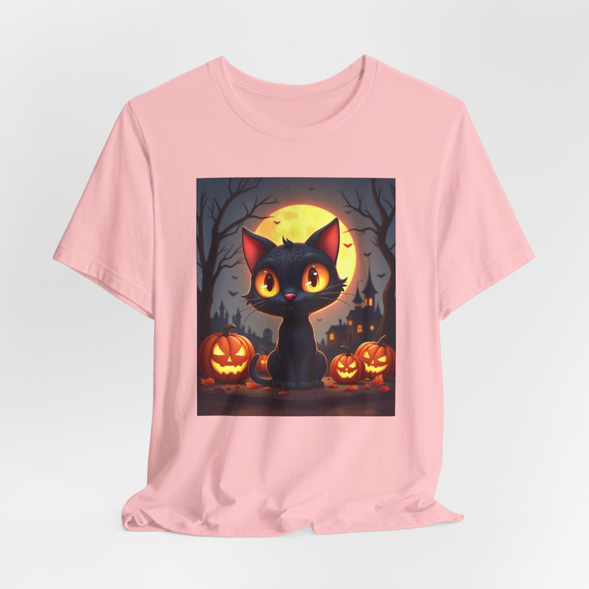 Pink t-shirt with a Halloween-themed graphic of a black cat and pumpkins on a light gray background