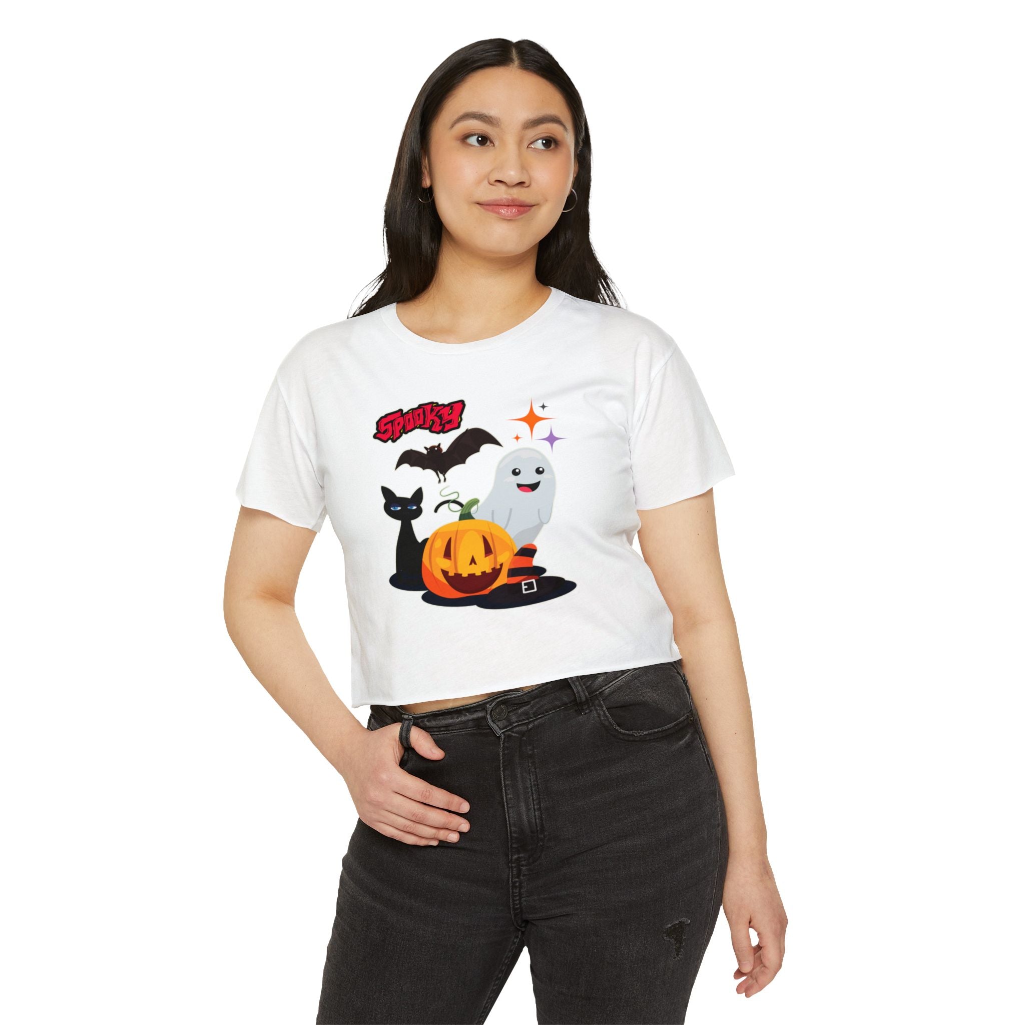 Person wearing a white t-shirt with Halloween-themed graphics on a white background