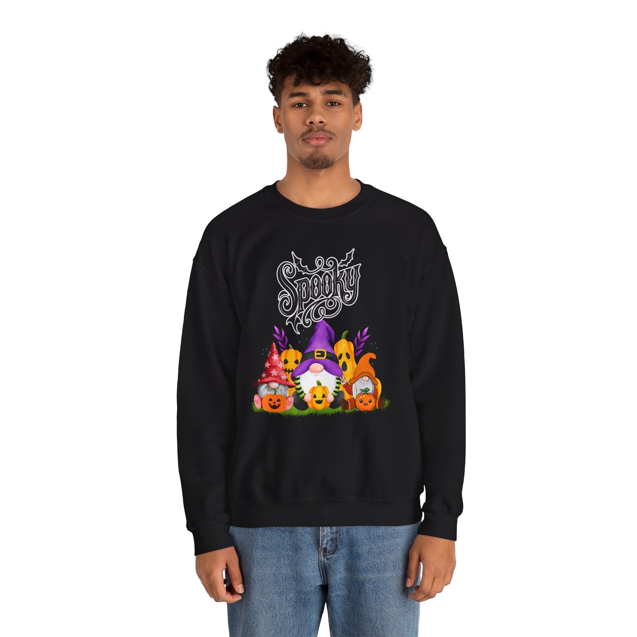 Person wearing a black sweatshirt with Halloween-themed design on a white background