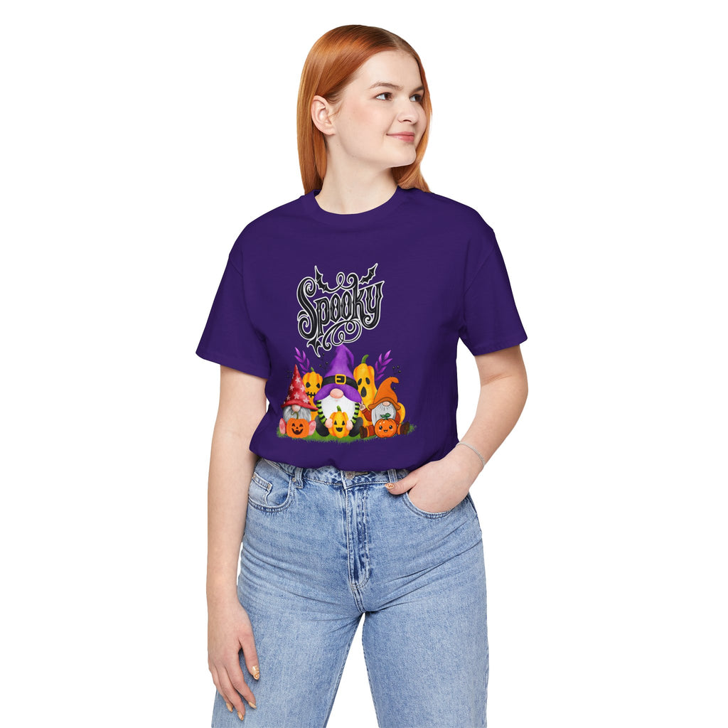 Person wearing a purple t-shirt with Halloween-themed design on a white background