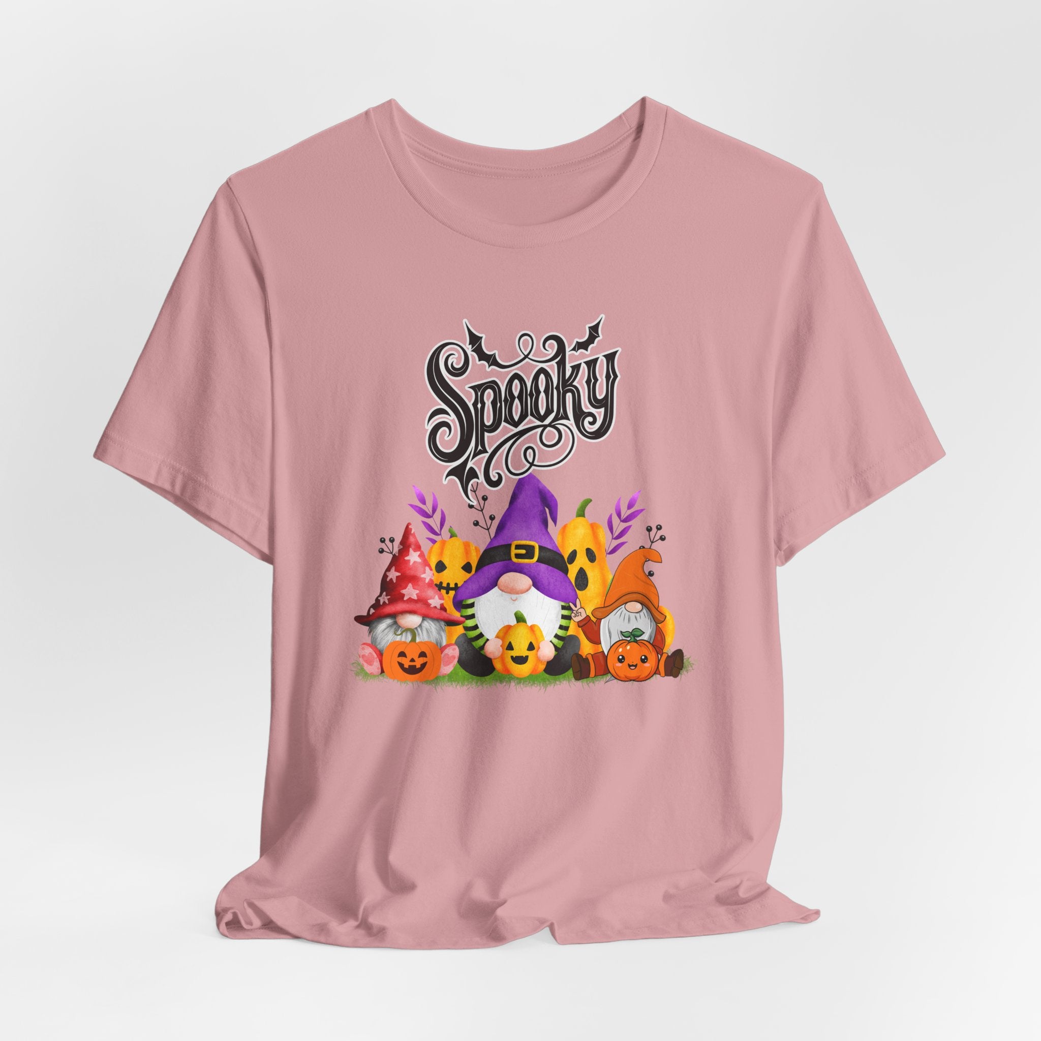 Orchid pink t-shirt with Halloween-themed design featuring spooky gnomes and pumpkins on a white background