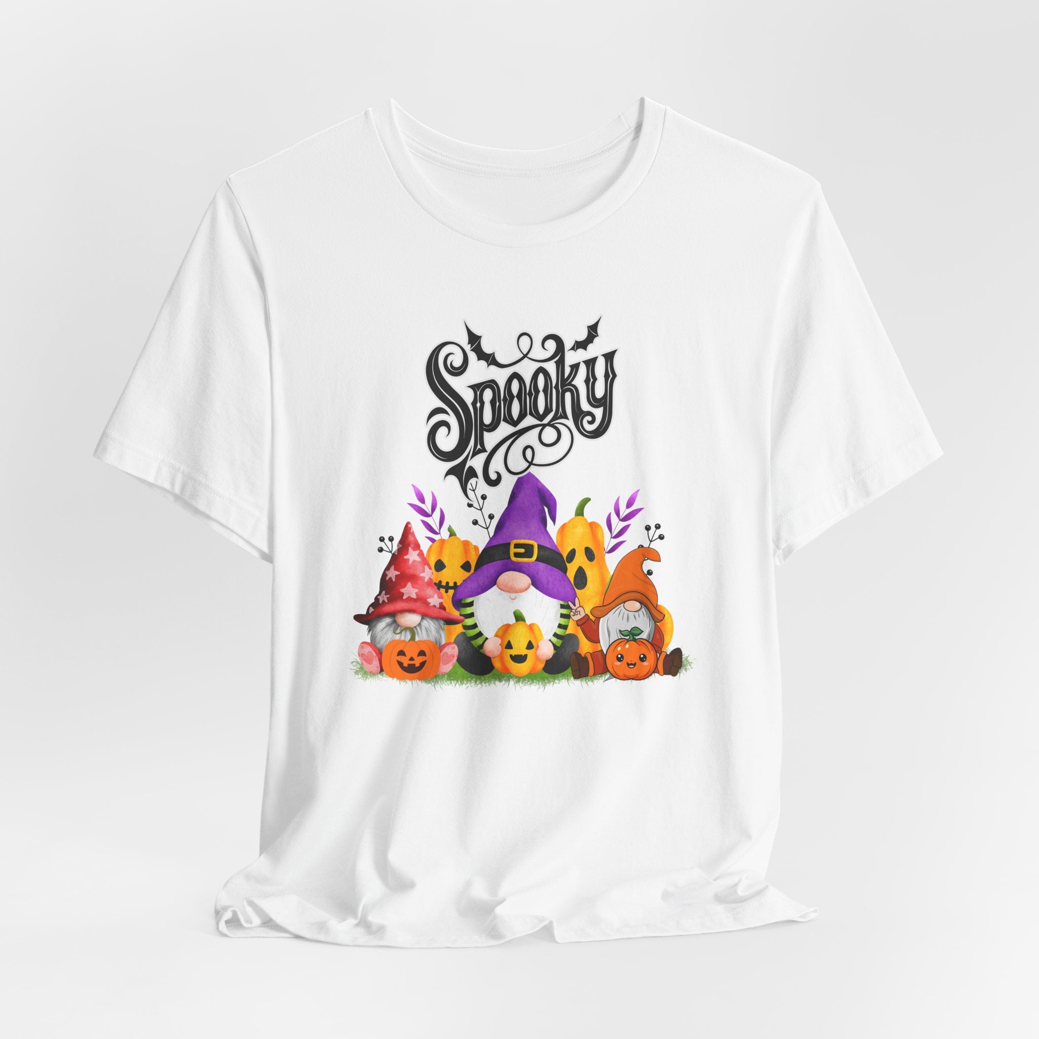 White t-shirt with Halloween-themed design featuring spooky gnomes and pumpkins on a white background