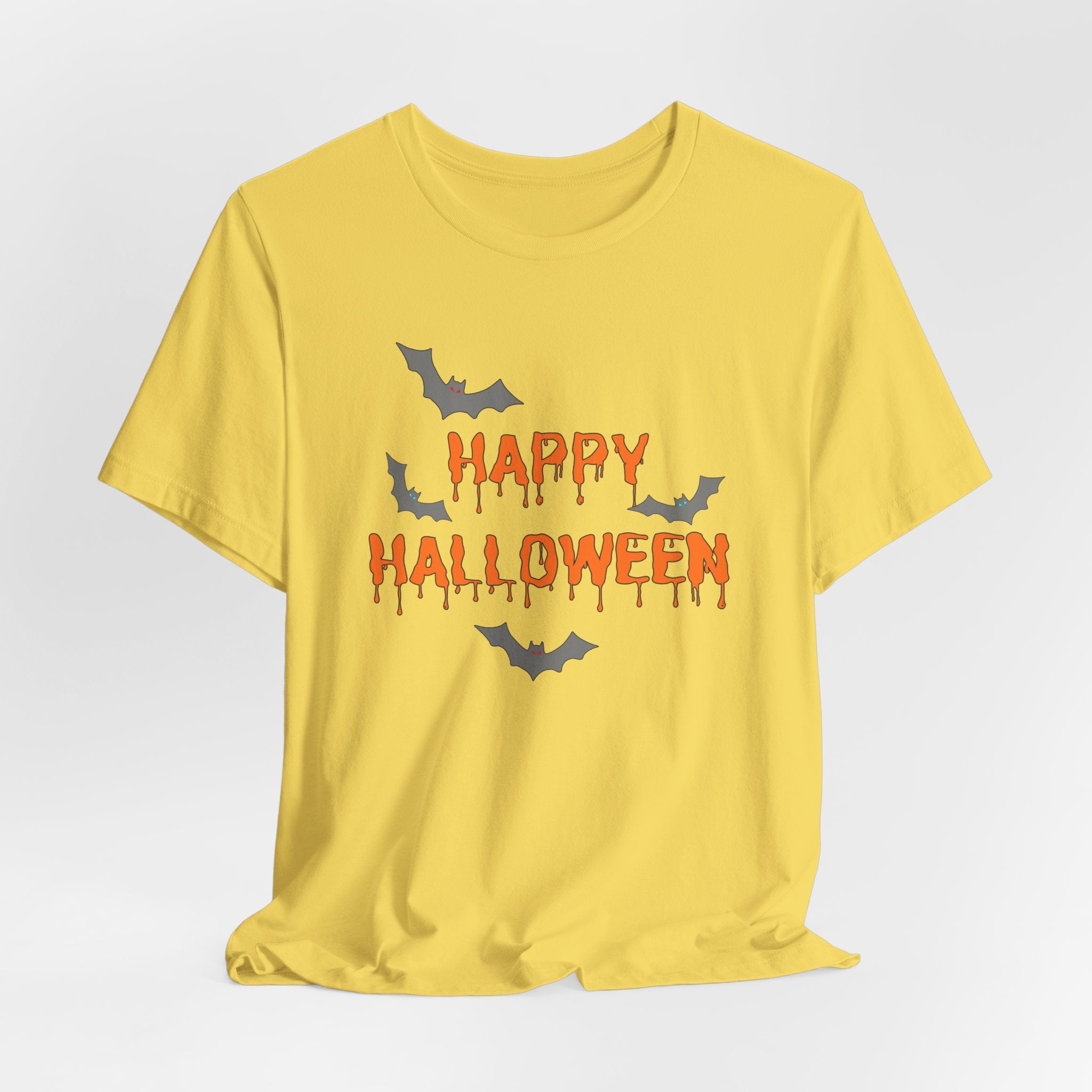 Yellow t-shirt with 'Happy Halloween' text and bats on a light gray background