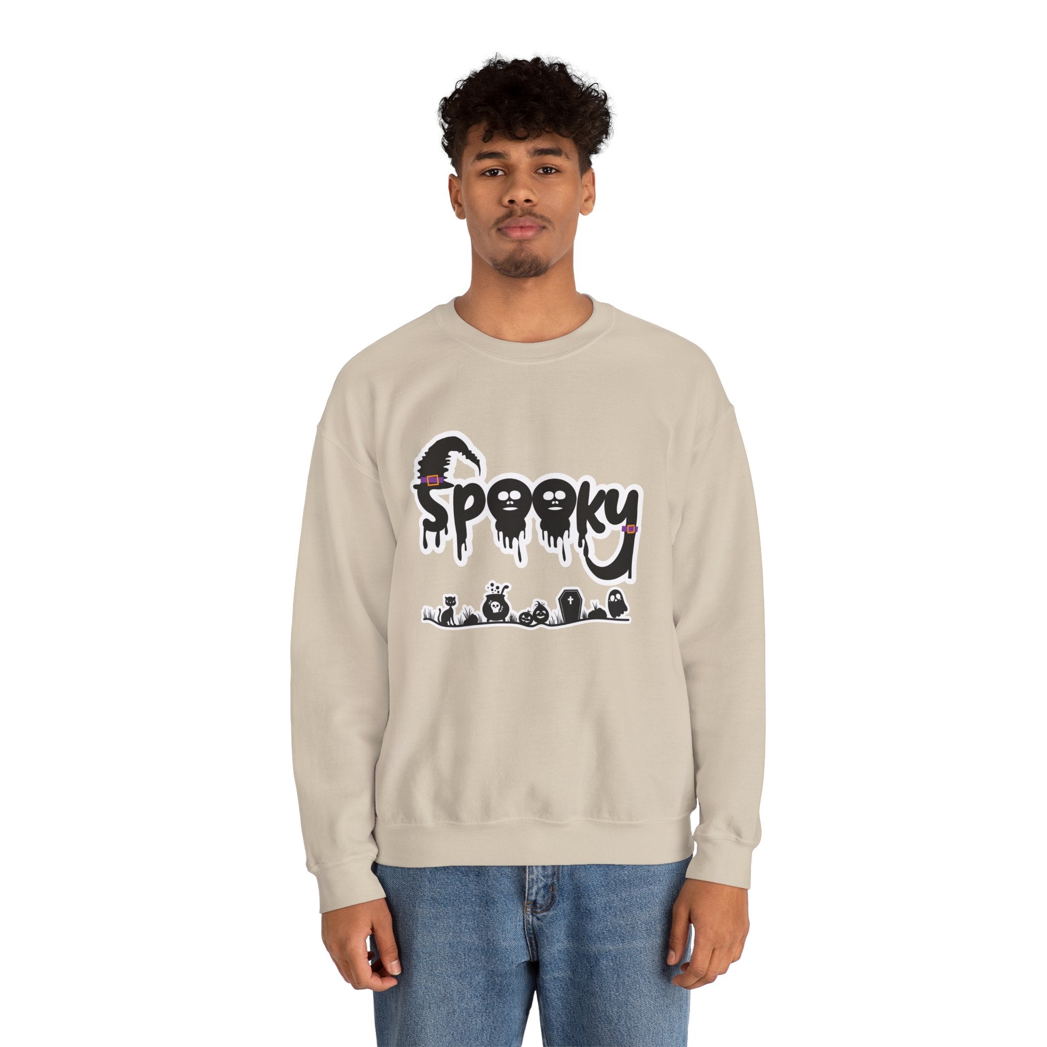 Person wearing a beige sweatshirt with 'Spooky' graphic design on a white background