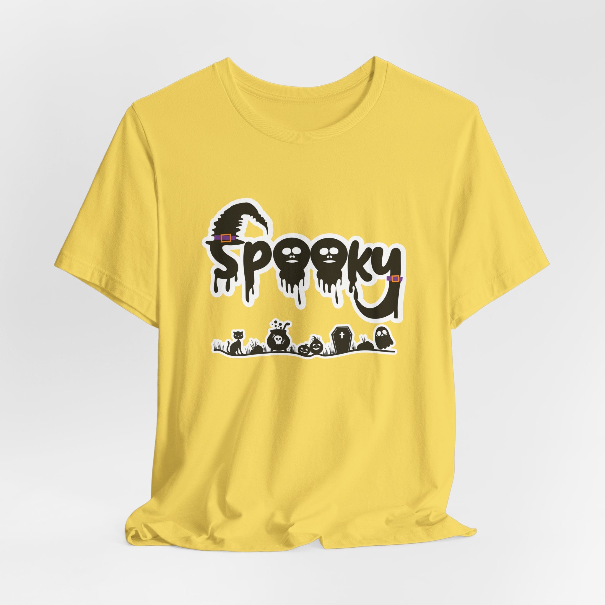 Maze yellowt-shirt with 'Spooky' halloween ghost, pumpkins, cat, and witch graphic design on a white background