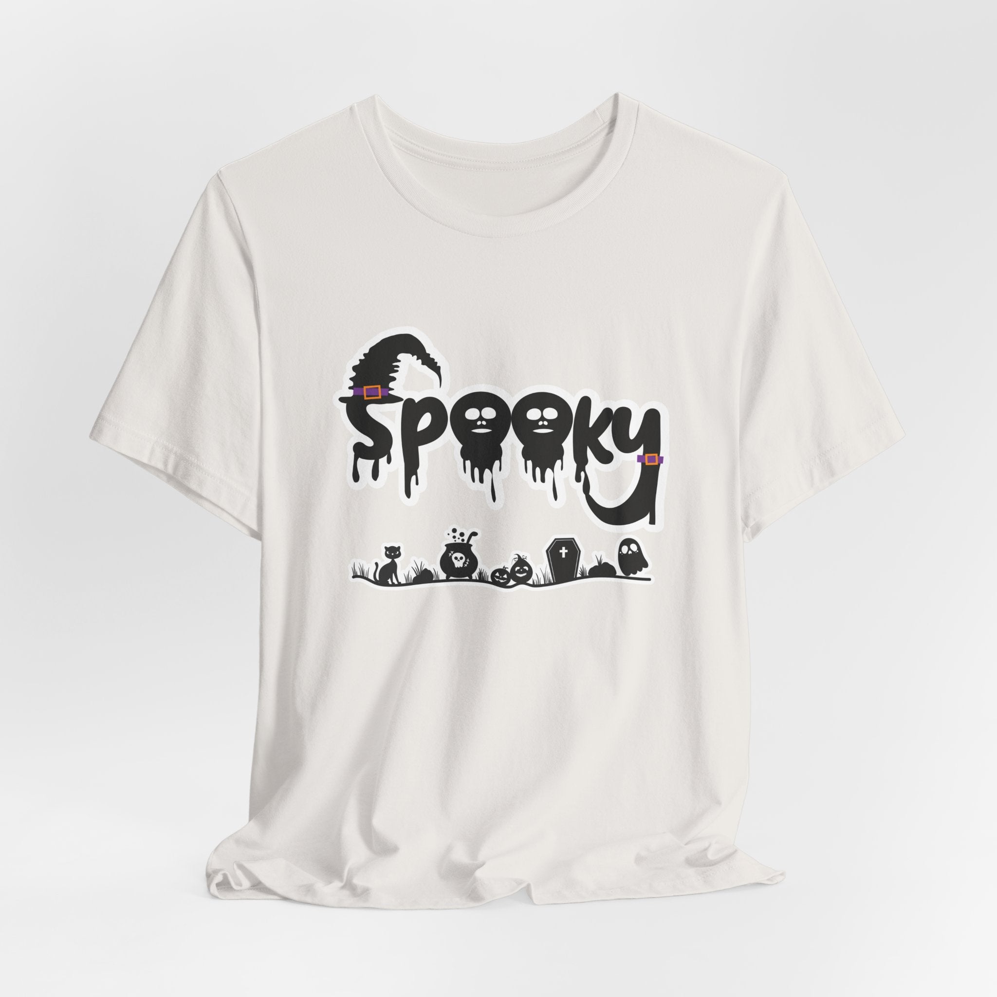 Vintage white t-shirt with 'Spooky' halloween ghost, pumpkins, cat, and witch graphic design on a white background