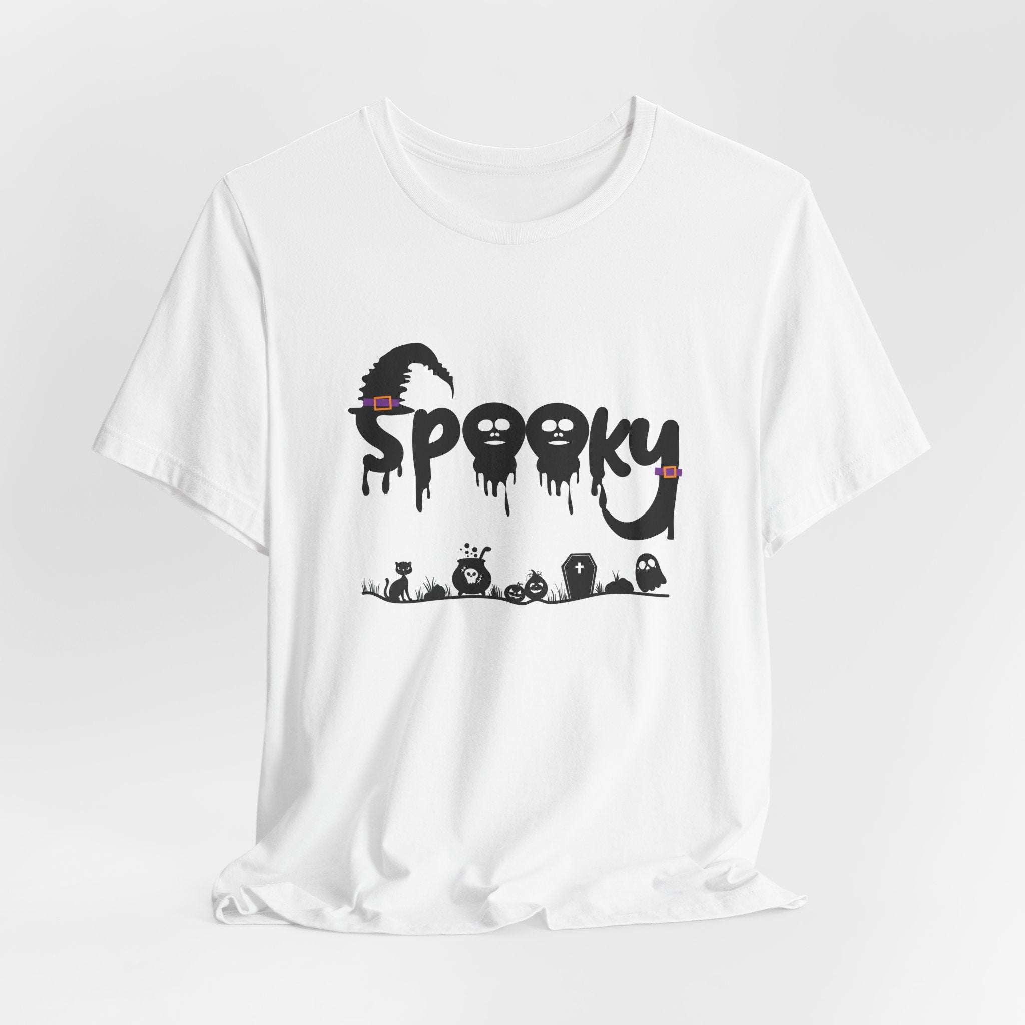 White t-shirt with 'Spooky' halloween ghost, pumpkins, cat, and witch graphic design on a white background