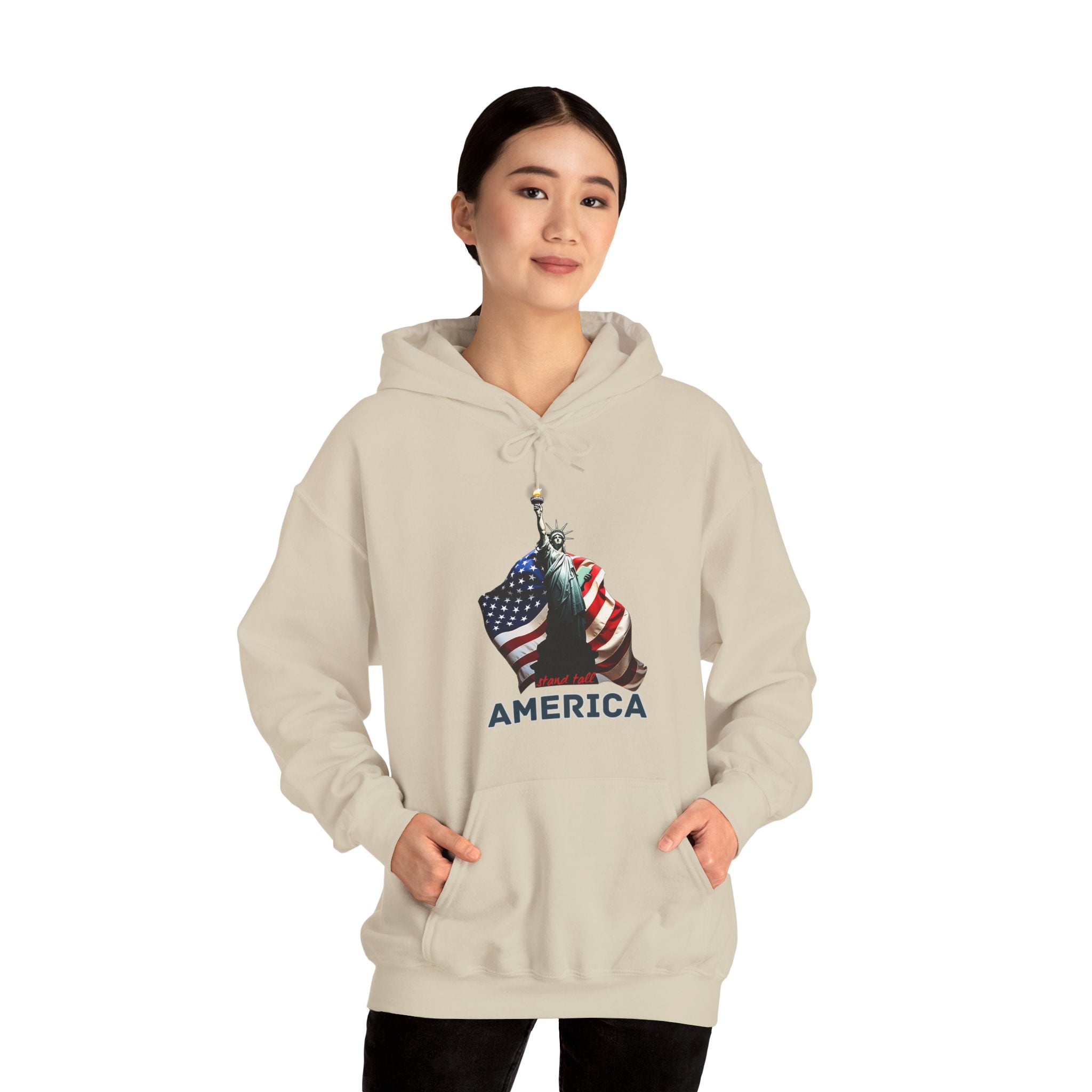 Person wearing a beige hoodie with an American flag design on a white background