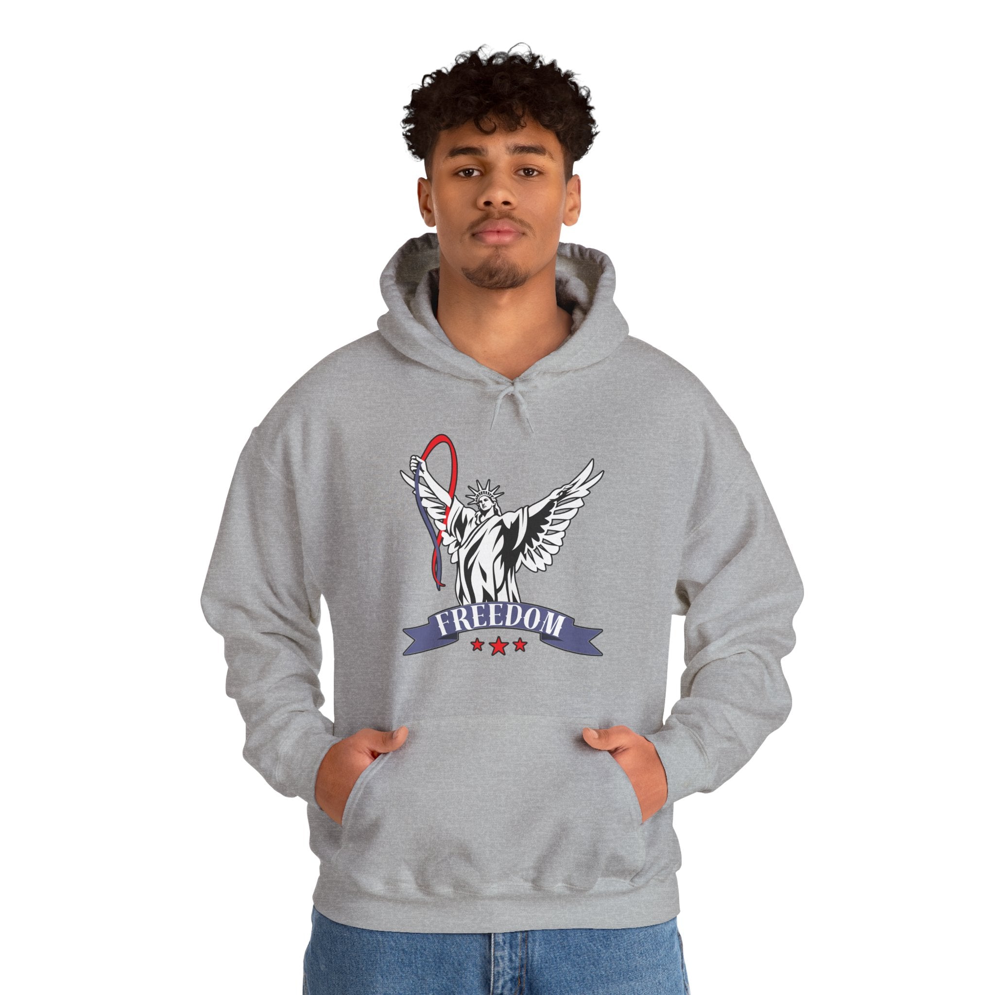 Person wearing a gray hoodie with a graphic of statue of liberty with wings design and freedom text on a white background