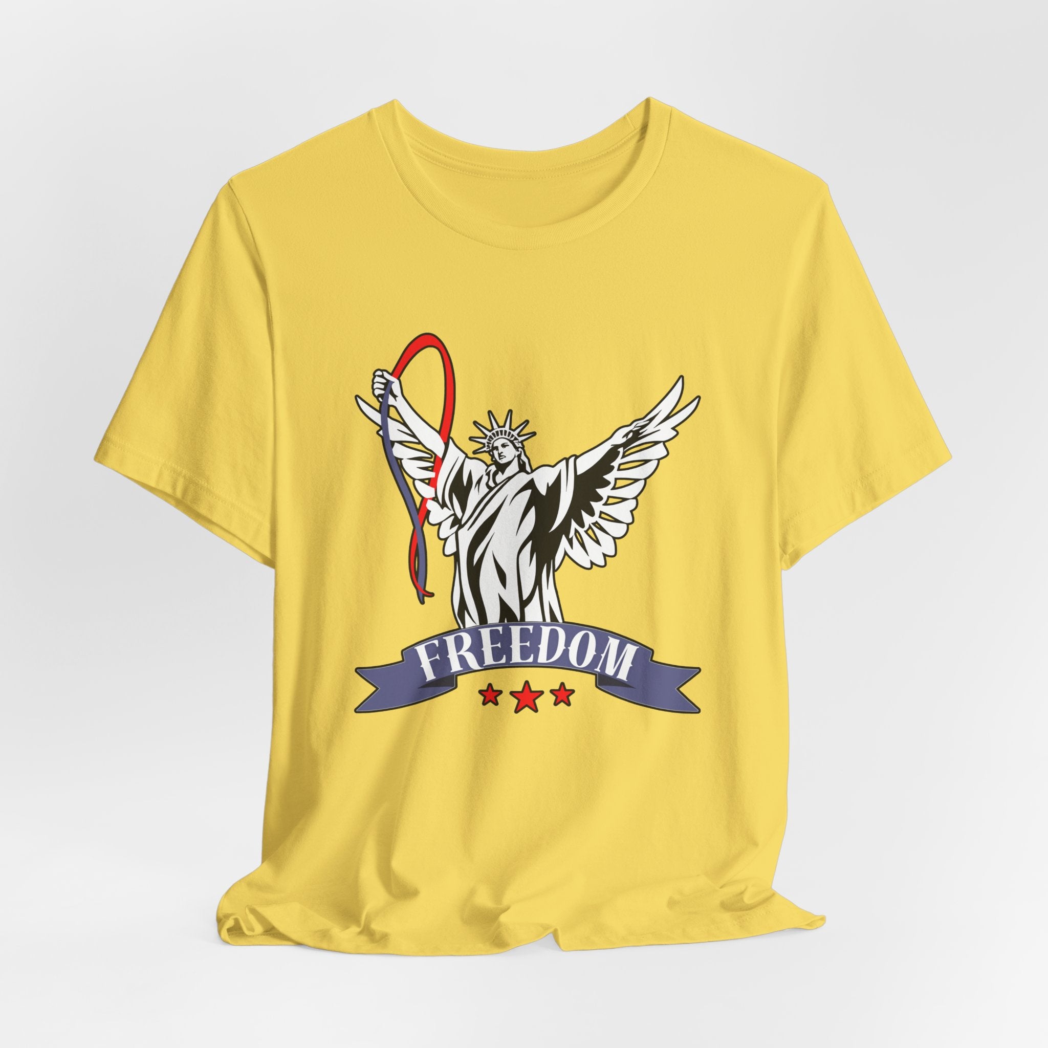 Maze yellow t-shirt with a graphic design of the Statue of Liberty holding a banner with 'Freedom' on a light gray background.