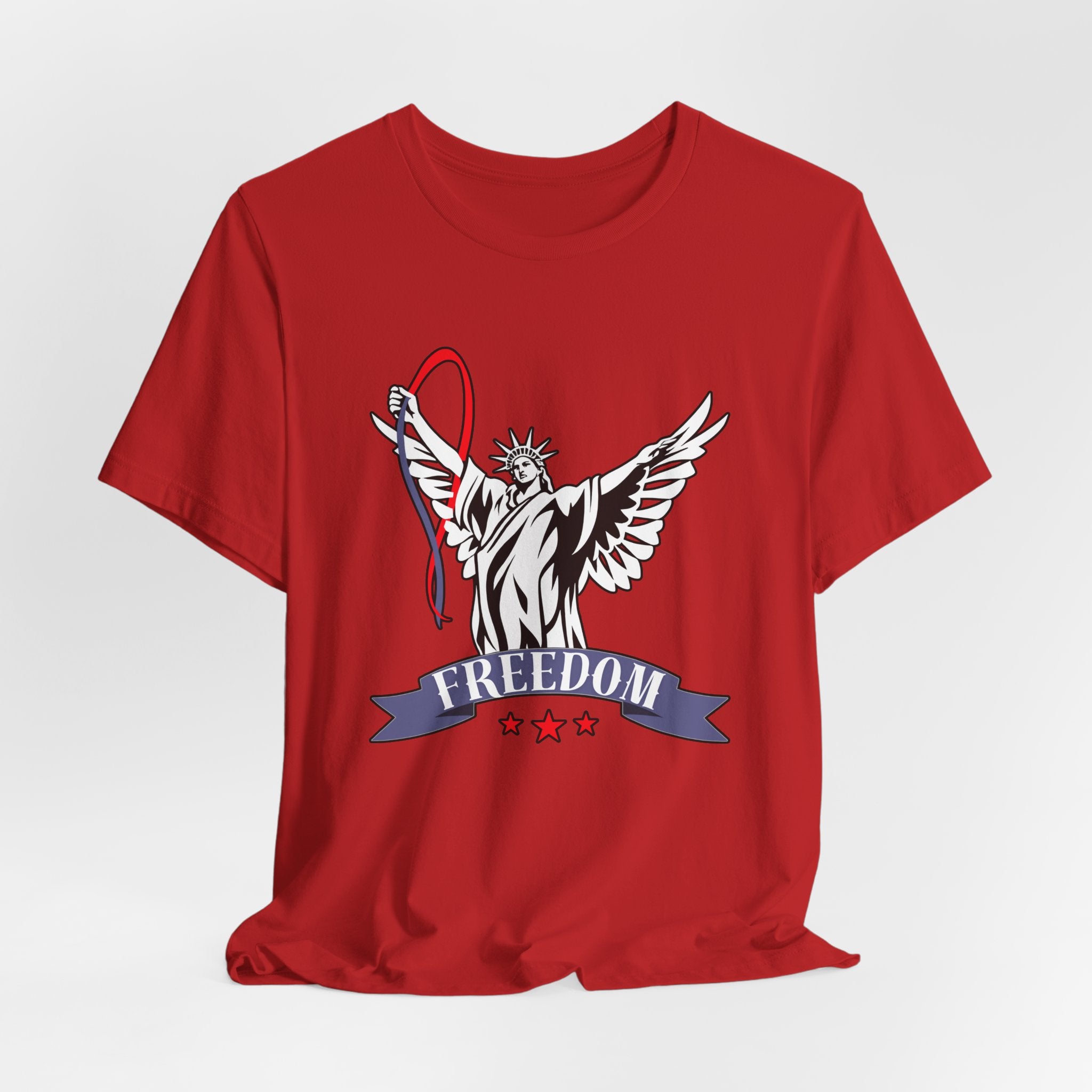 Red t-shirt with a graphic design of the Statue of Liberty holding a banner with 'Freedom' on a light gray background.