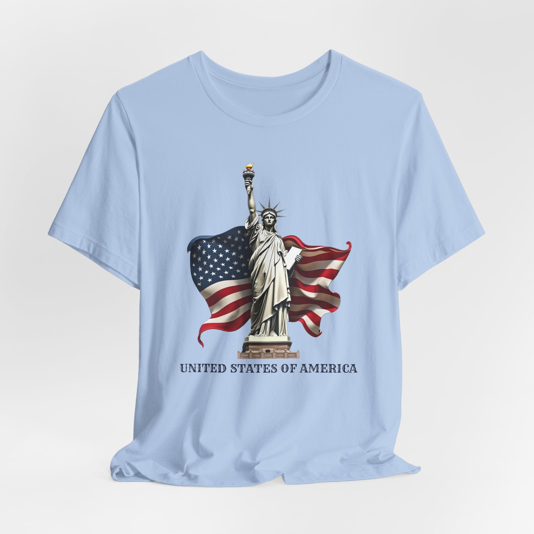 Baby light blue t-shirt with Statue of Liberty and American flag design on a white background