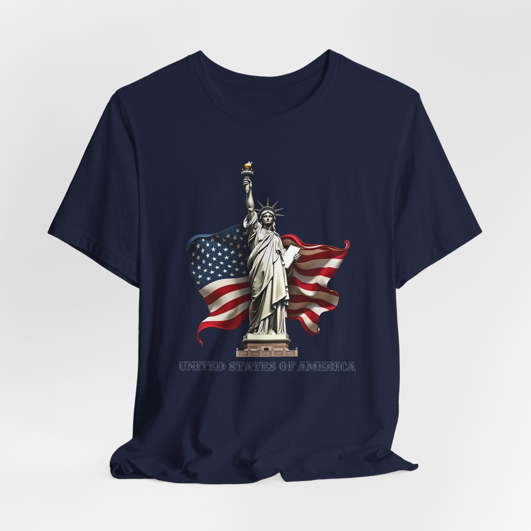 Navy blue t-shirt with Statue of Liberty and American flag design on a white background