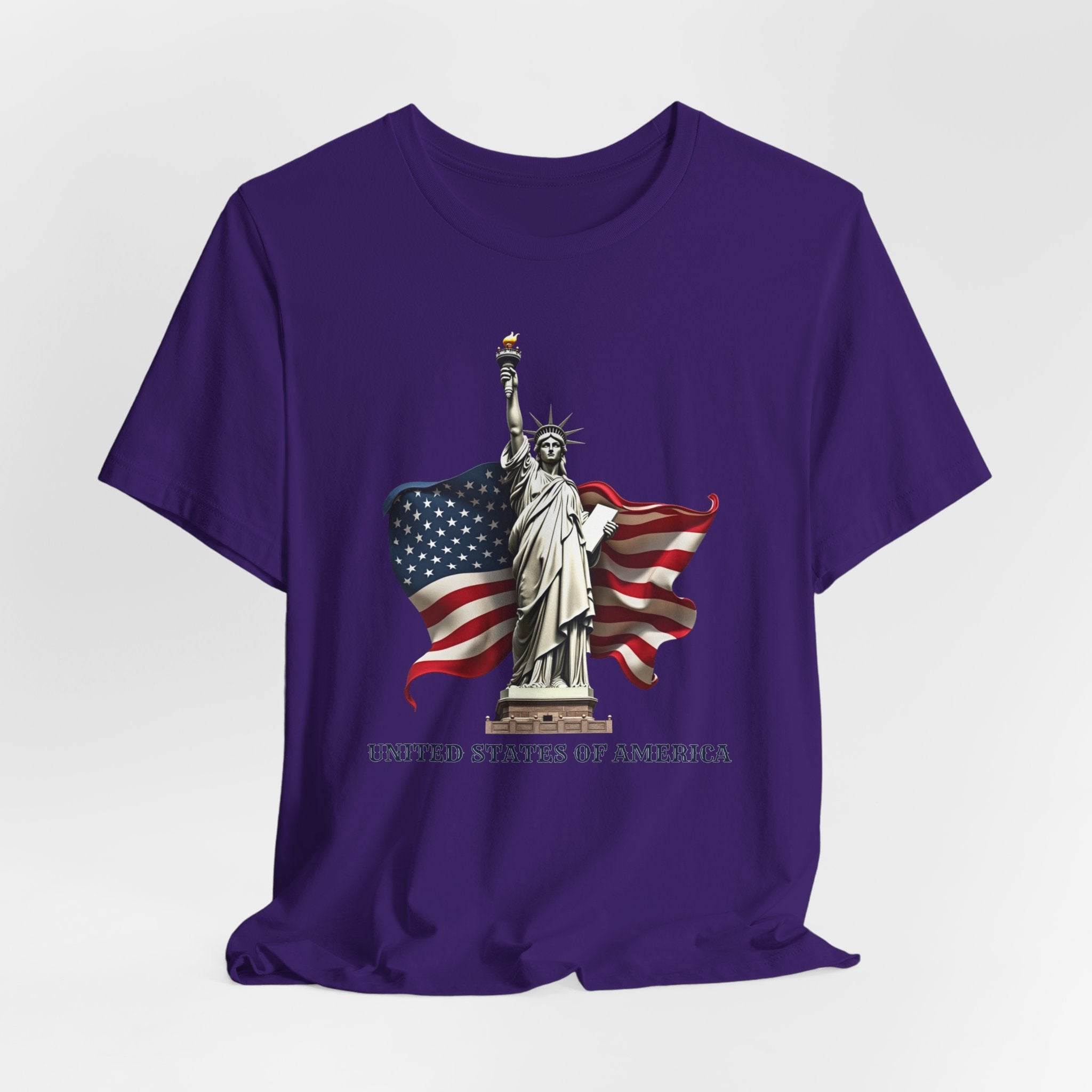 Team purple t-shirt with Statue of Liberty and American flag design on a white background
