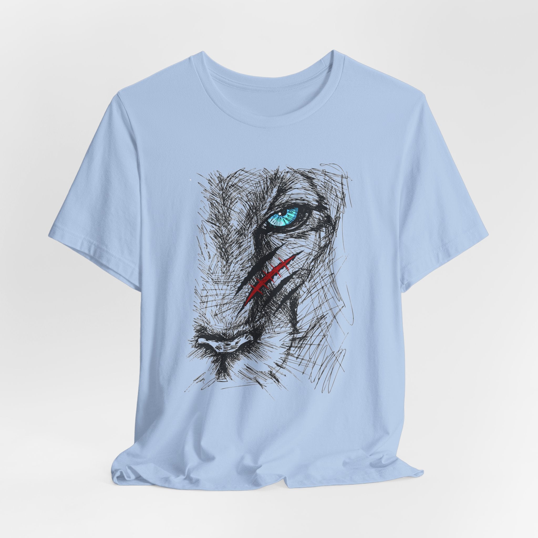 Baby light blue t-shirt with a graphic of a wounded lion's face with a blue eye