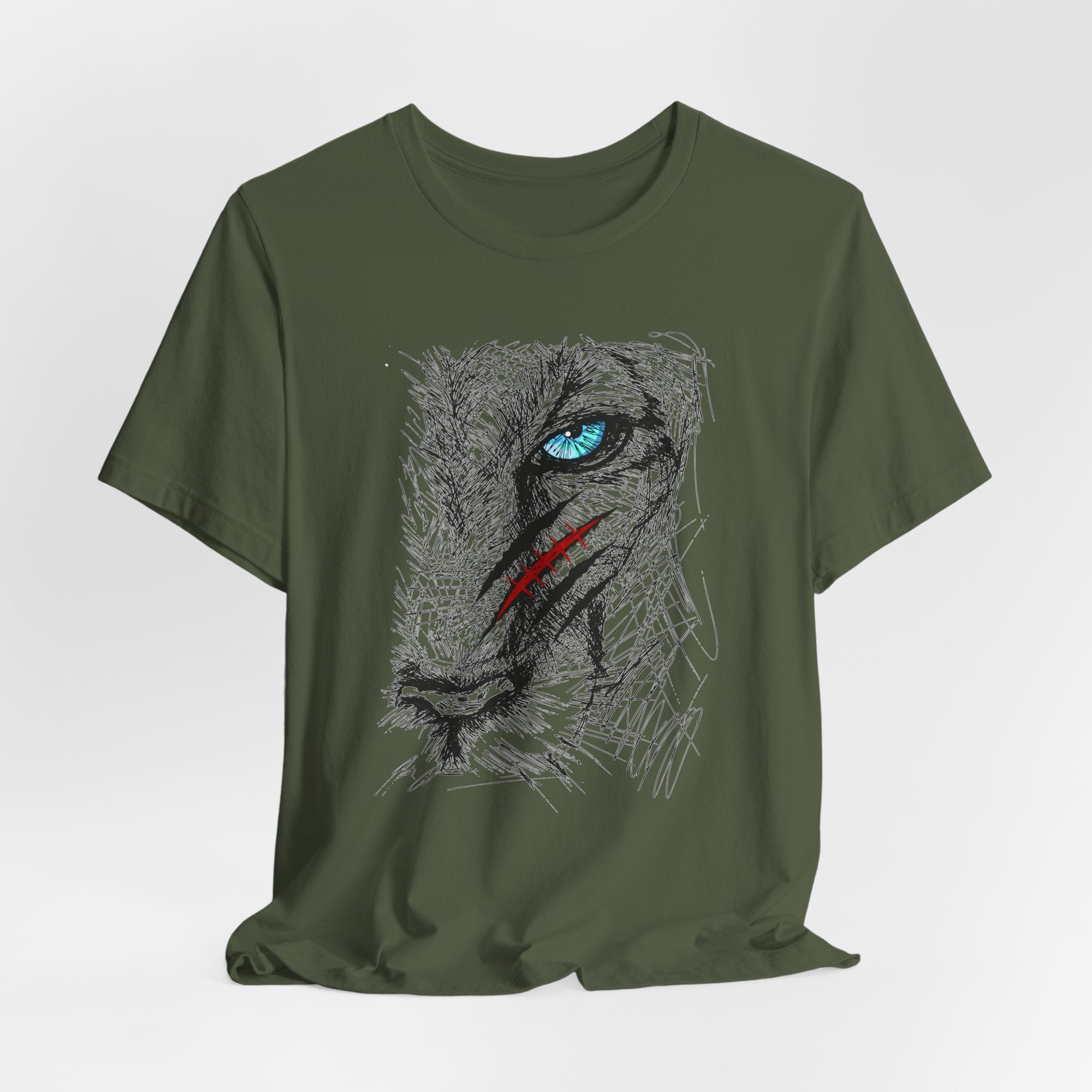 Military green t-shirt with a graphic of a wounded lion's face with a blue eye