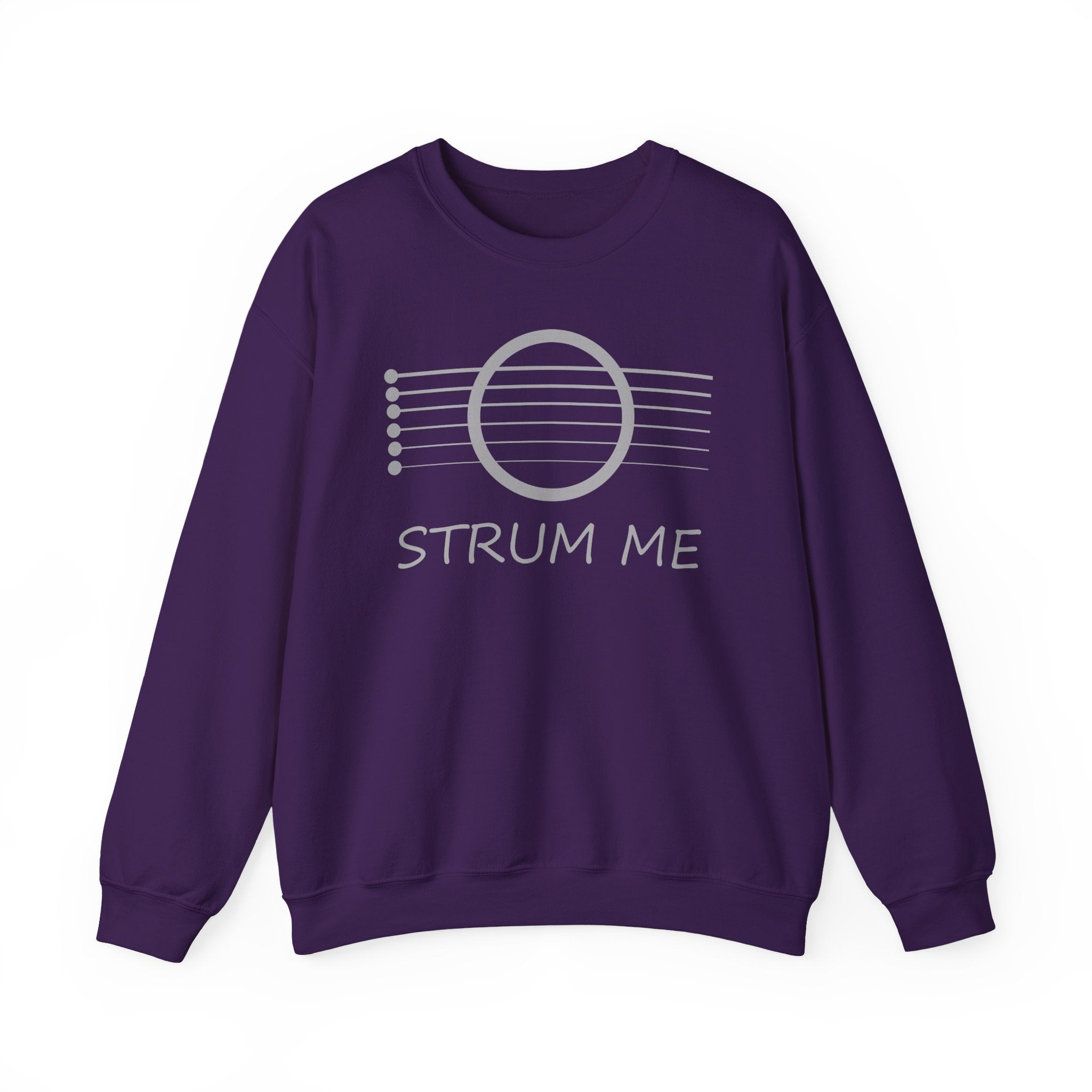 Purple sweatshirt with 'STRUM ME' text and acoustic guitar string design on a white background
