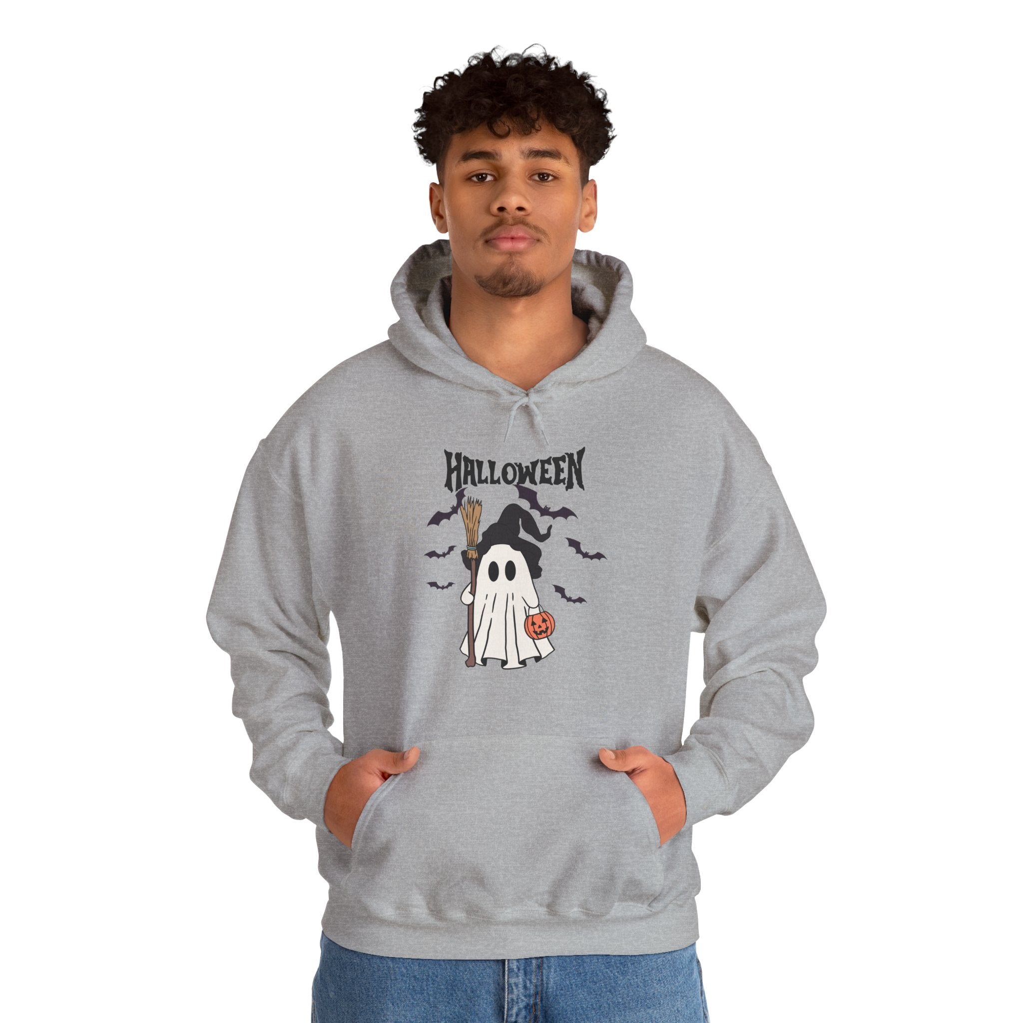 Person wearing a gray hoodie with Halloween design on a white background