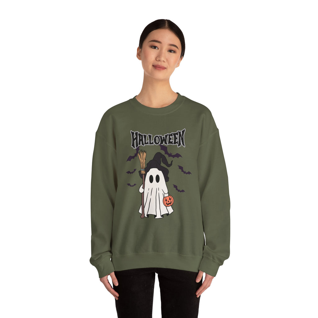 Person wearing a green Halloween-themed sweatshirt with a ghost and candy corn design.