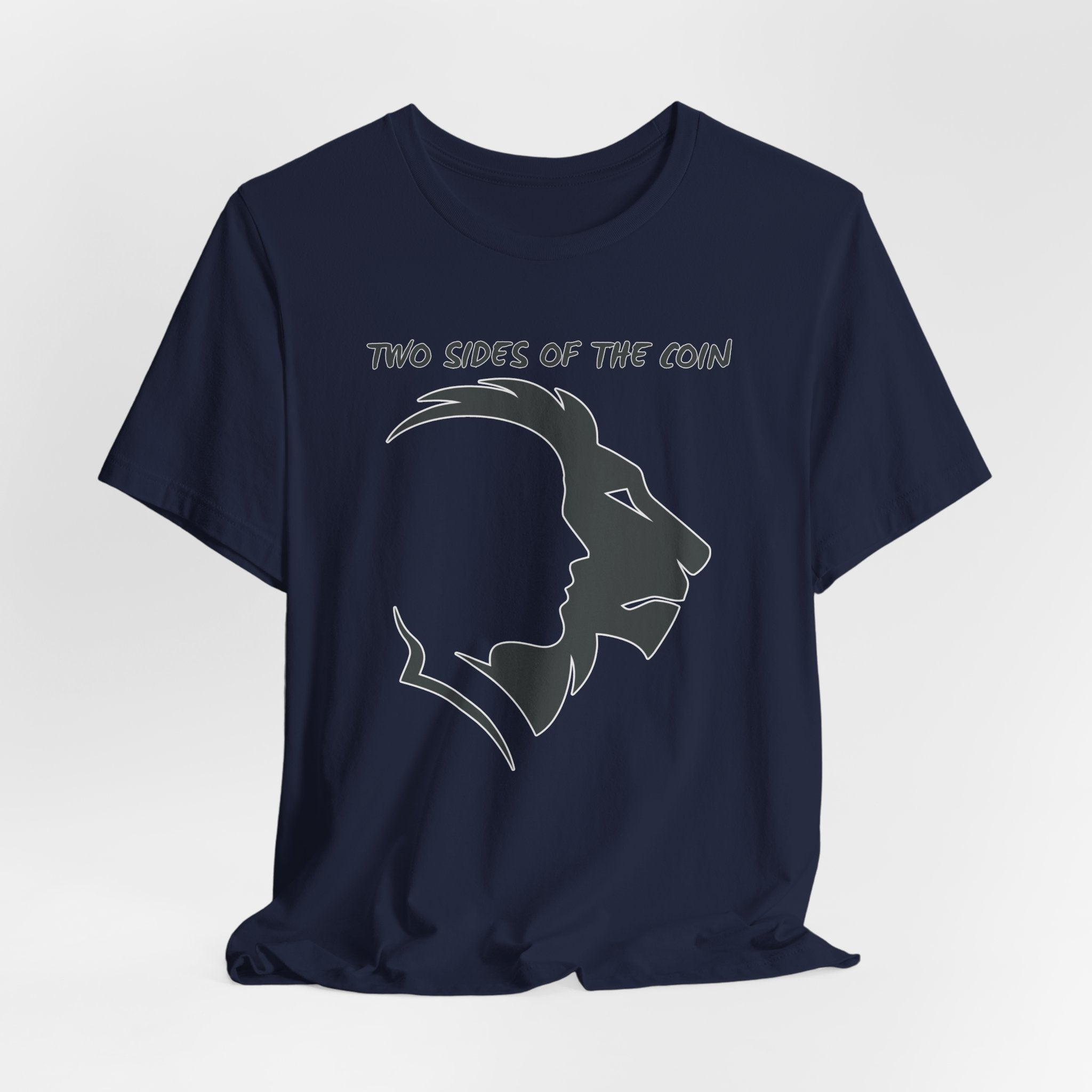 Navy blue t-shirt with dark gray graphic of lion and human faces and text 'Two Sides of the Coin' on a light gray background