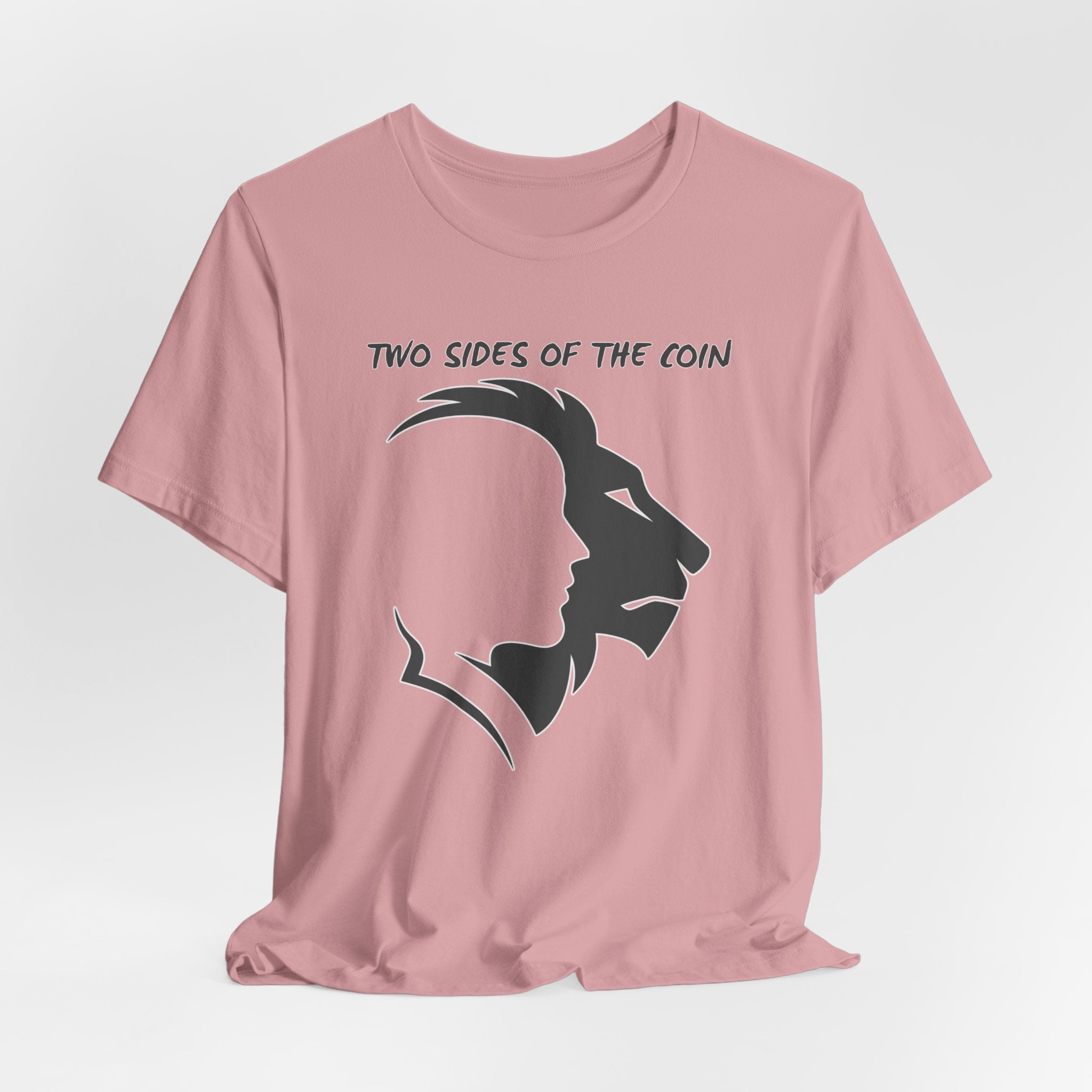 Orchid pink t-shirt with dark gray graphic of lion and human faces and text 'Two Sides of the Coin' on a light gray background