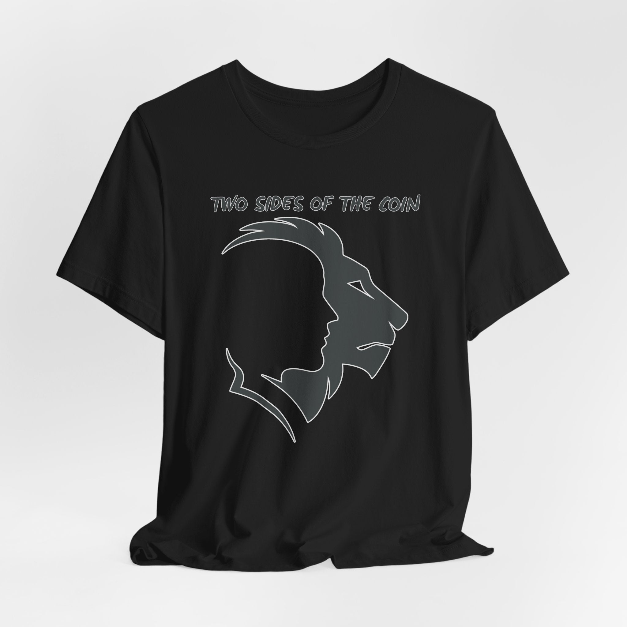 Vintage black t-shirt with dark gray graphic of lion and human faces and text 'Two Sides of the Coin' on a light gray background