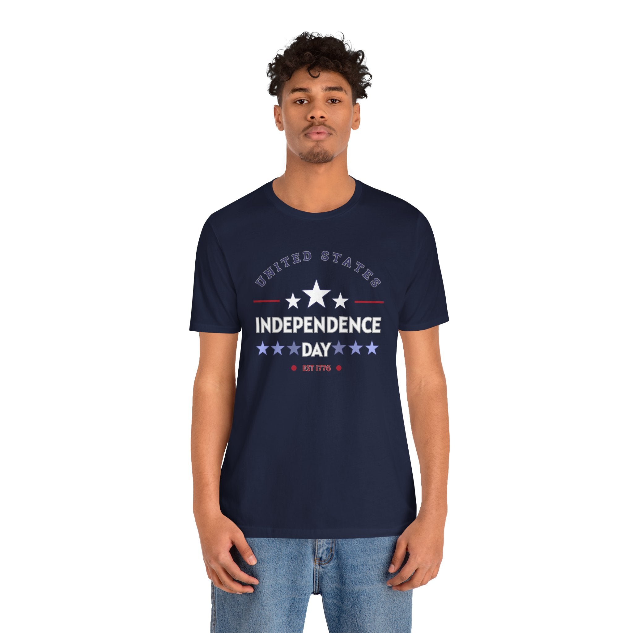 Man wearing a navy blue t-shirt with 'Independence Day' text and star design on a white background