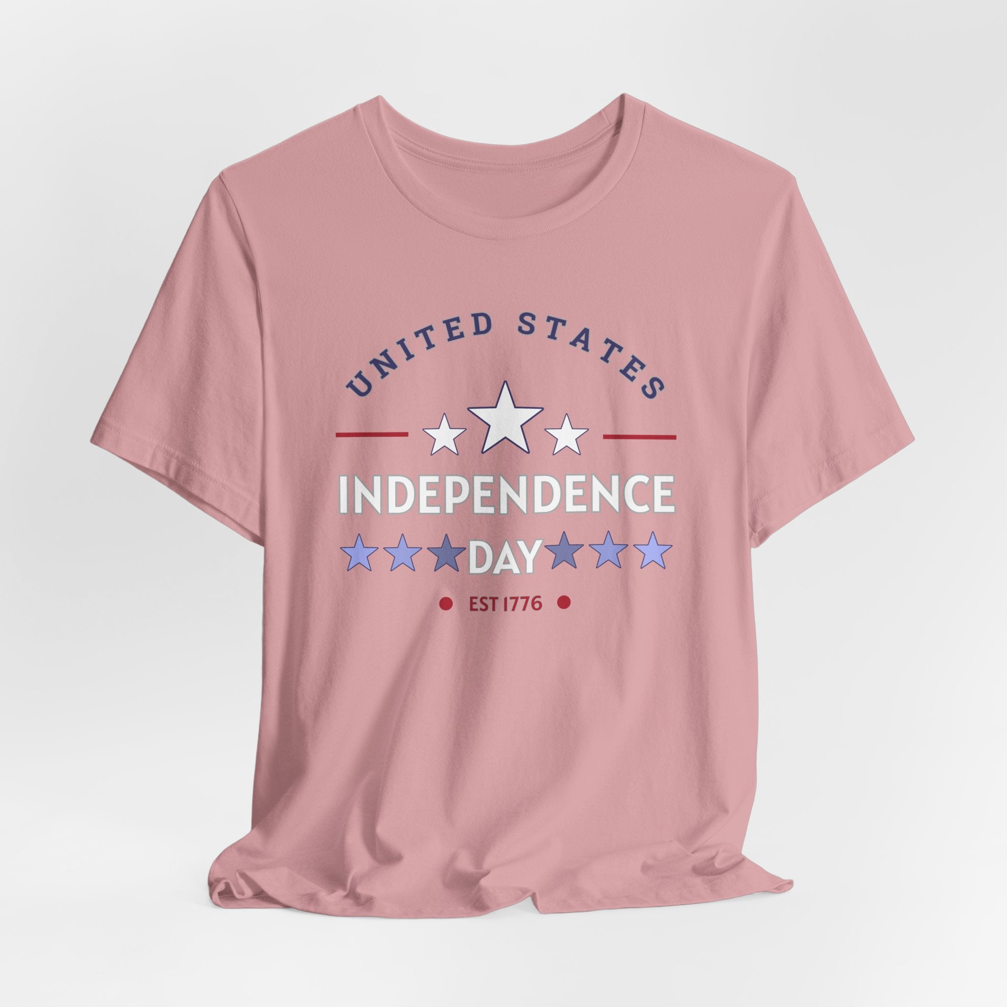 Orchid pink t-shirt with 'United States Independence Day' text and star graphics on a light gray background