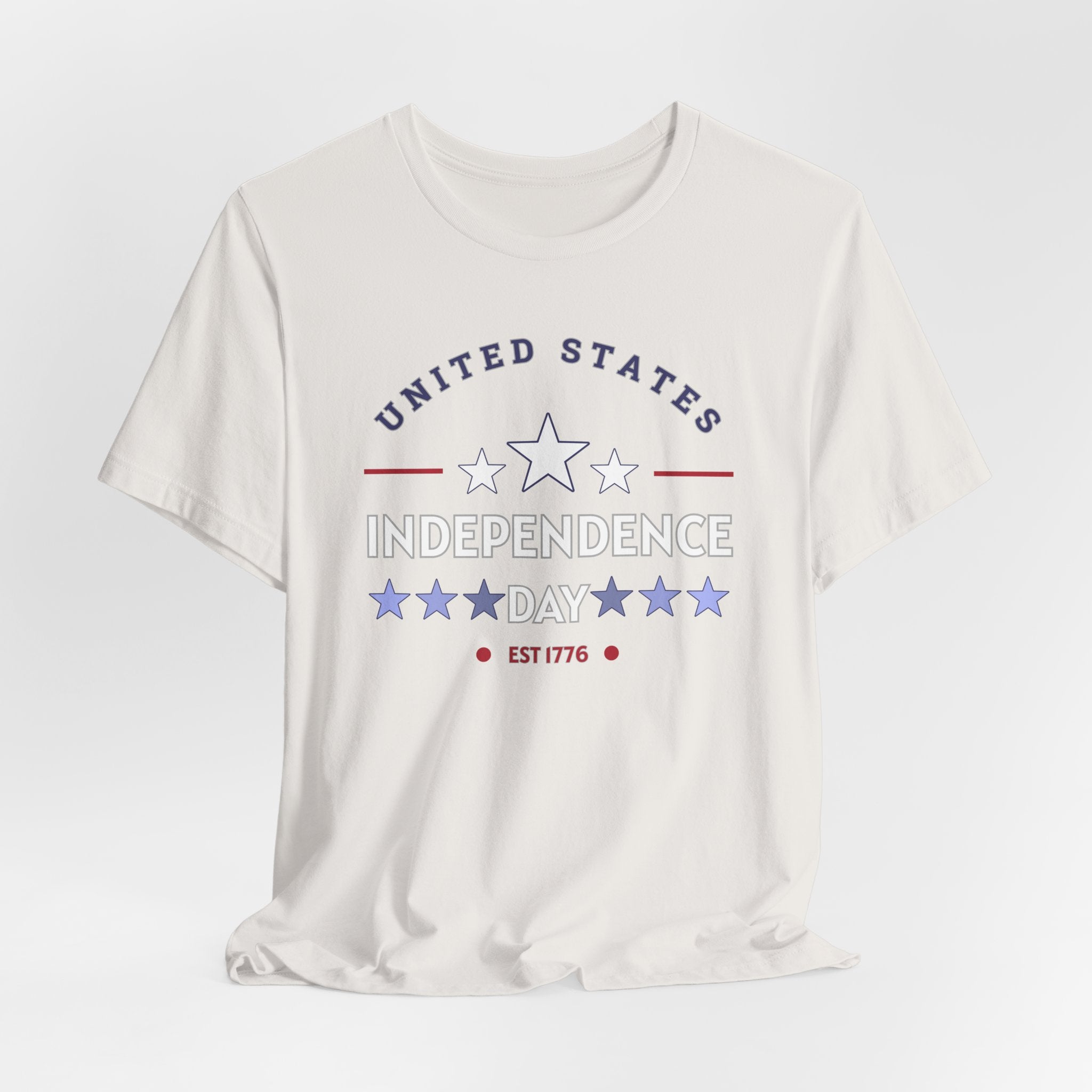 Vintage white t-shirt with 'United States Independence Day' text and star graphics on a white background